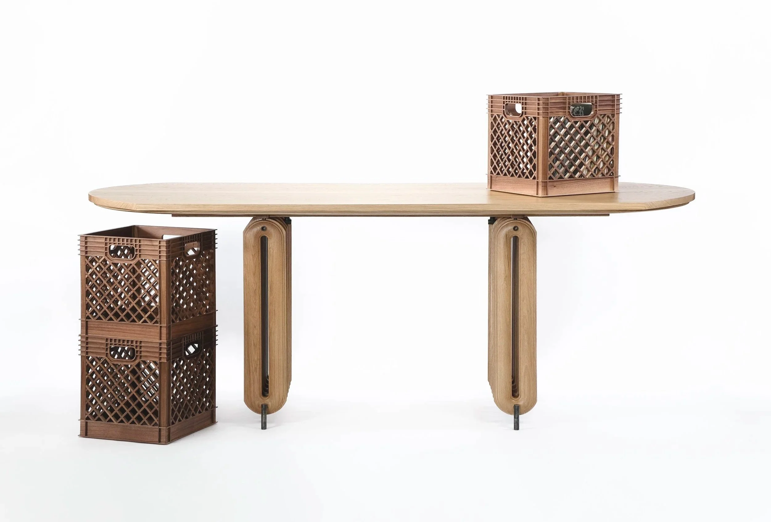 A modern wooden extendable dining table with two brown lattice baskets on each side, one stacked and one on top of the table against a plain white background.