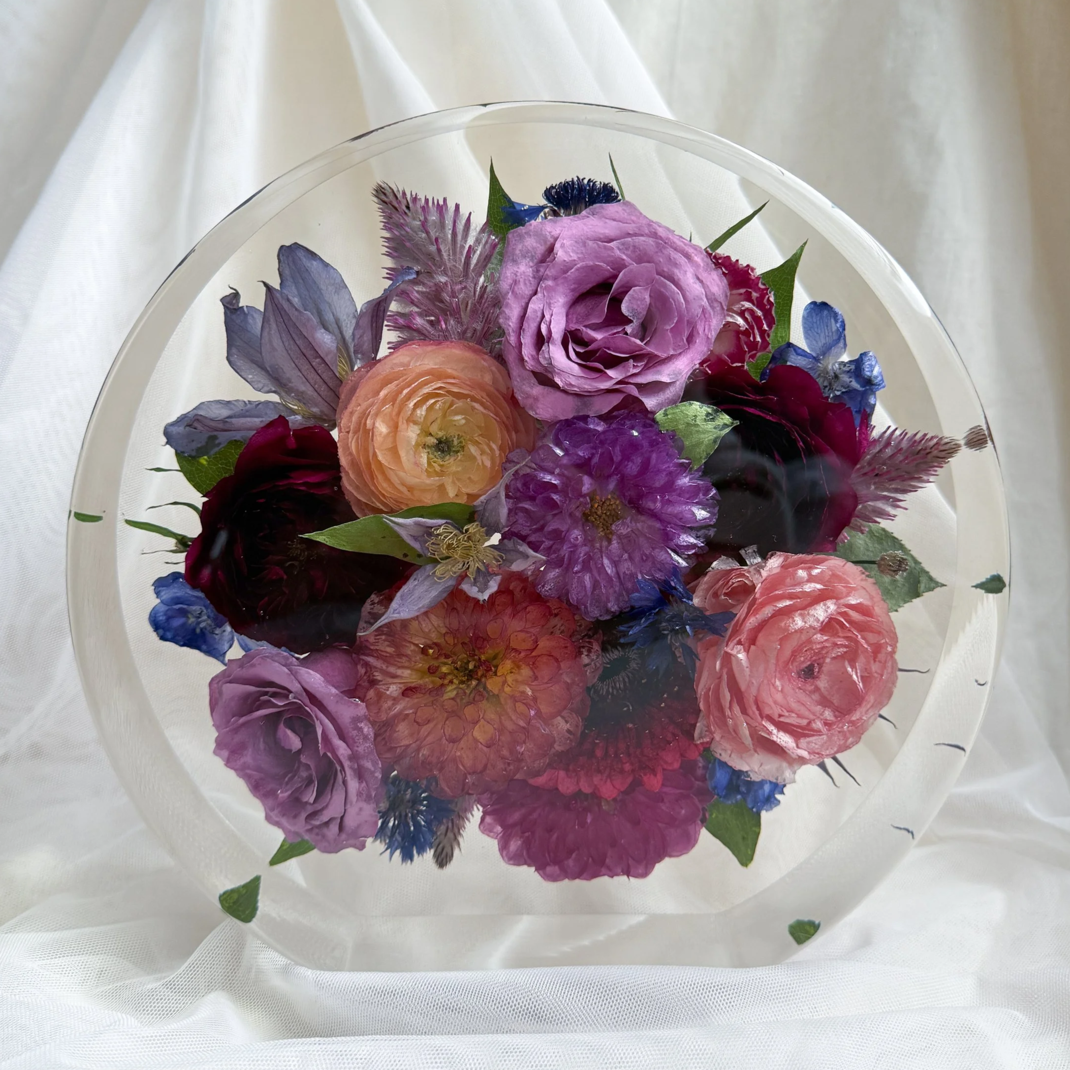 9-inch standing resin circle featuring preserved purple, burgundy, pink, and blue flowers with greenery