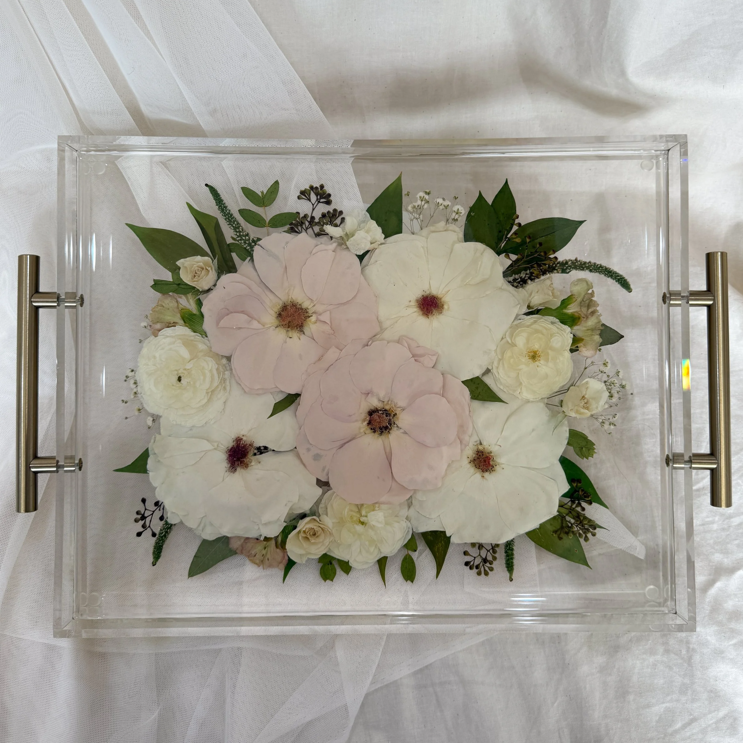 11-by-14-inch acrylic tray with silver handles preserving blush-pink and white flowers with green leaves