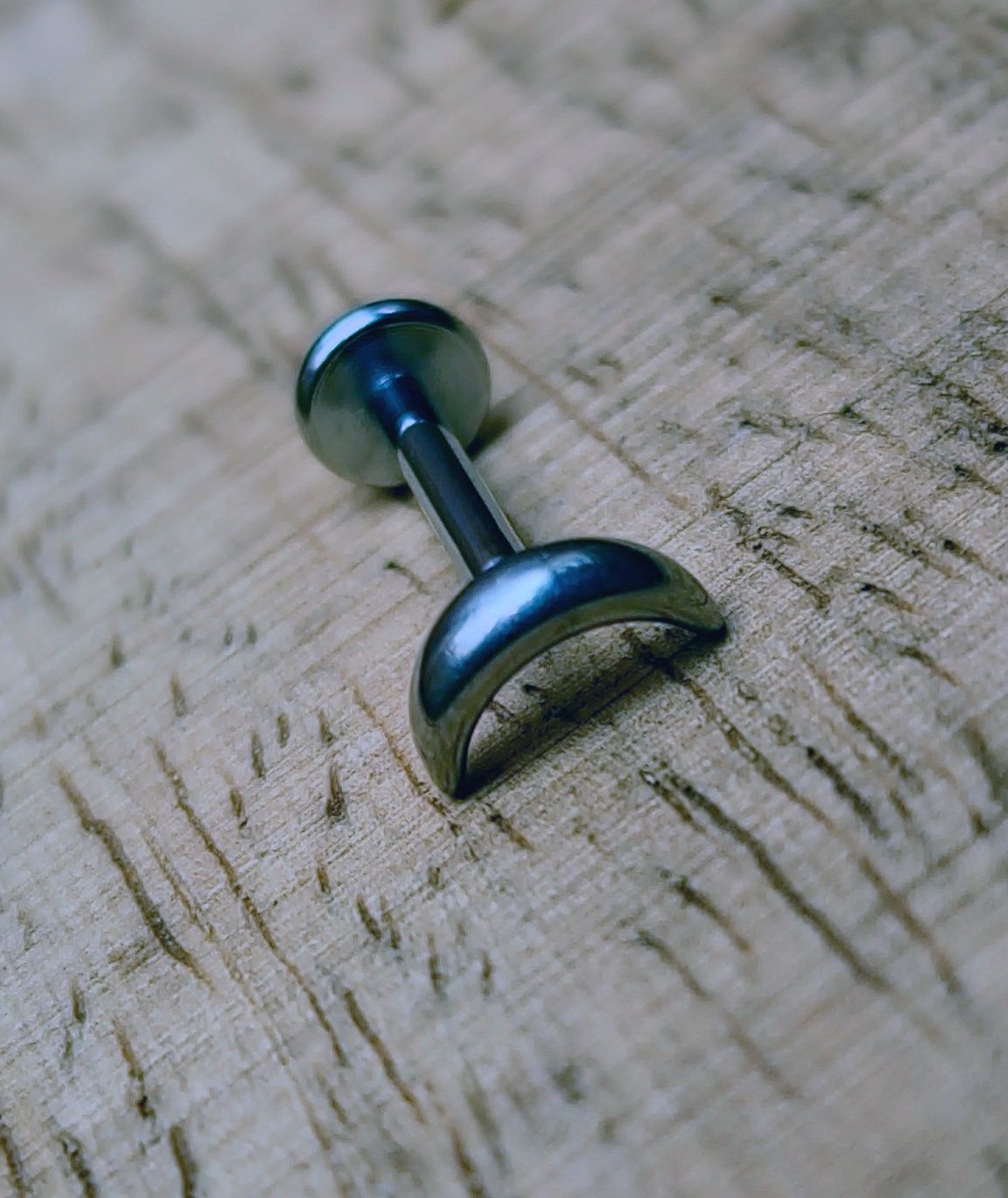 Titanium piercing labret, internally threaded with moon shaped top
