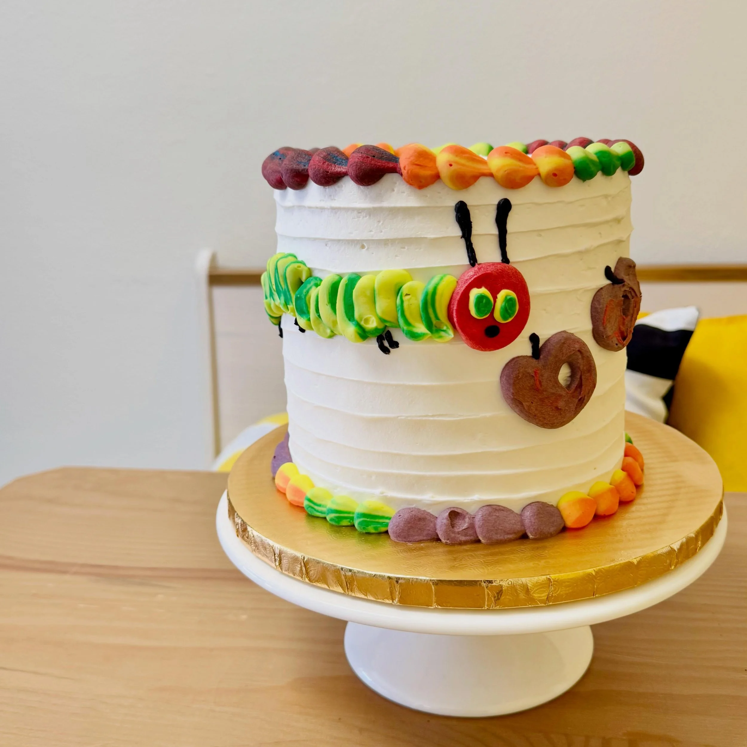 🐛Today&rsquo;s Cake of the Day! We had small friend turn three over the weekend and his current favorite book is The Very Hungry Caterpillar AND he loves plums 💜

🐛This was a 6 inch cake in our carrot cake flavor with cream cheese frosting.

🐛Our