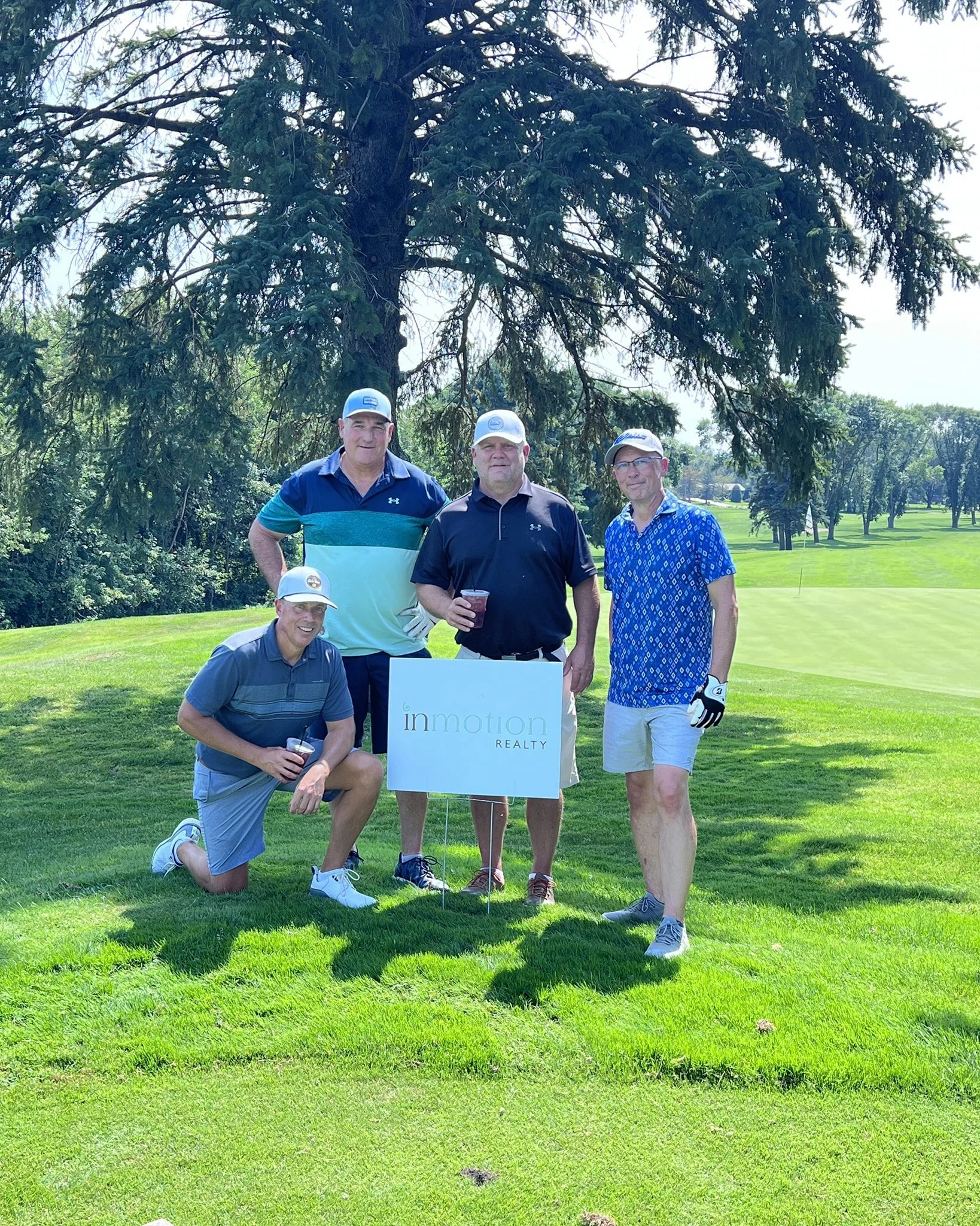 2025 InMotion Football Connections golf team. All 4 coached Sawyer in either football, hockey or baseball! Proud to support our local sports! #hastingsraiders #supportingourcommunity