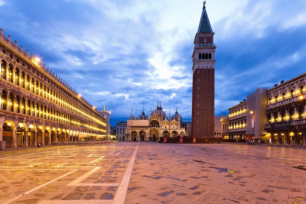 Image of Piazza San Marco - St. Mark's Square - in Venice, Italy, shown at dawn.