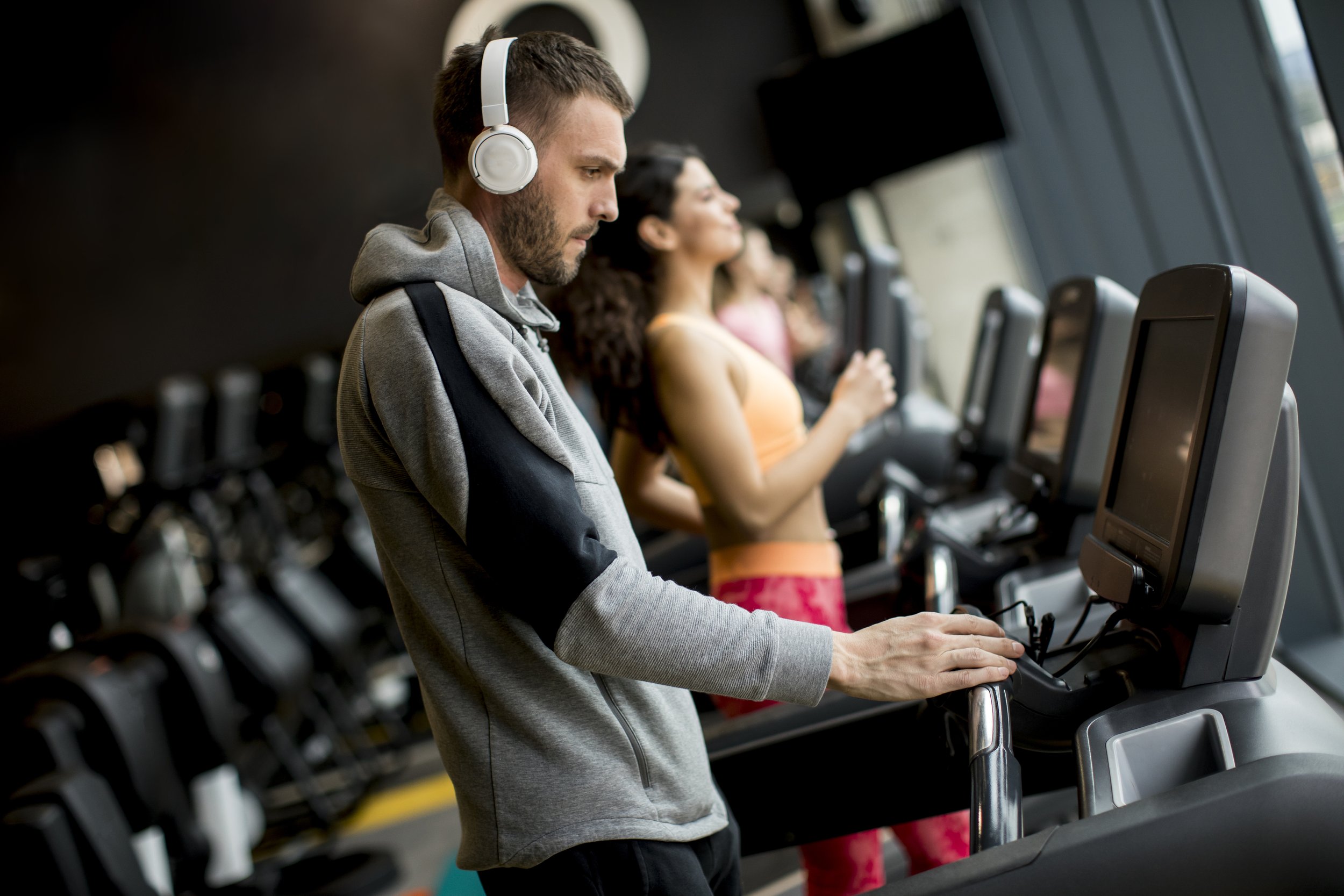 young-people-using-threadmill-in-modern-gym-2025-02-22-06-23-04-utc.jpg
