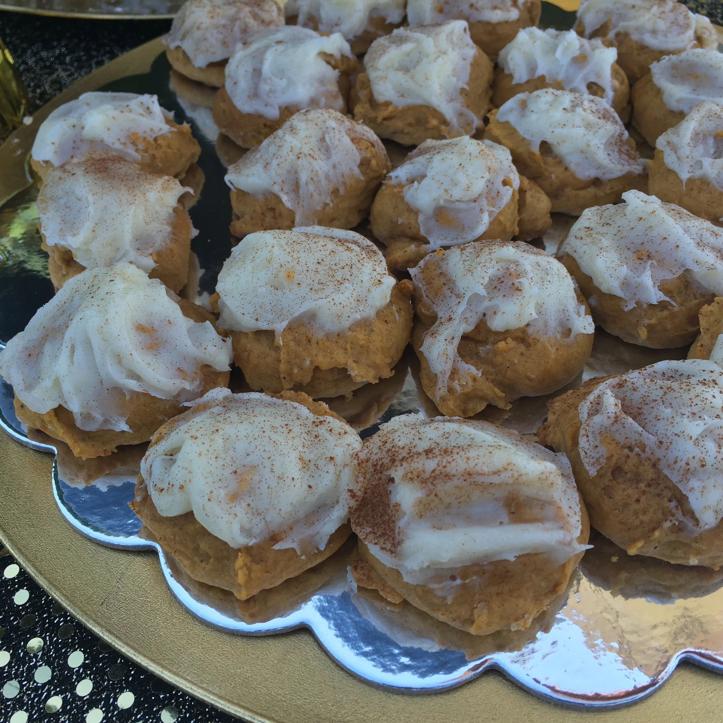 Seasonal Soft Pumpkin Cookies.  Garnished with Cream Cheese Frosting, Cinnamon Sprinkle