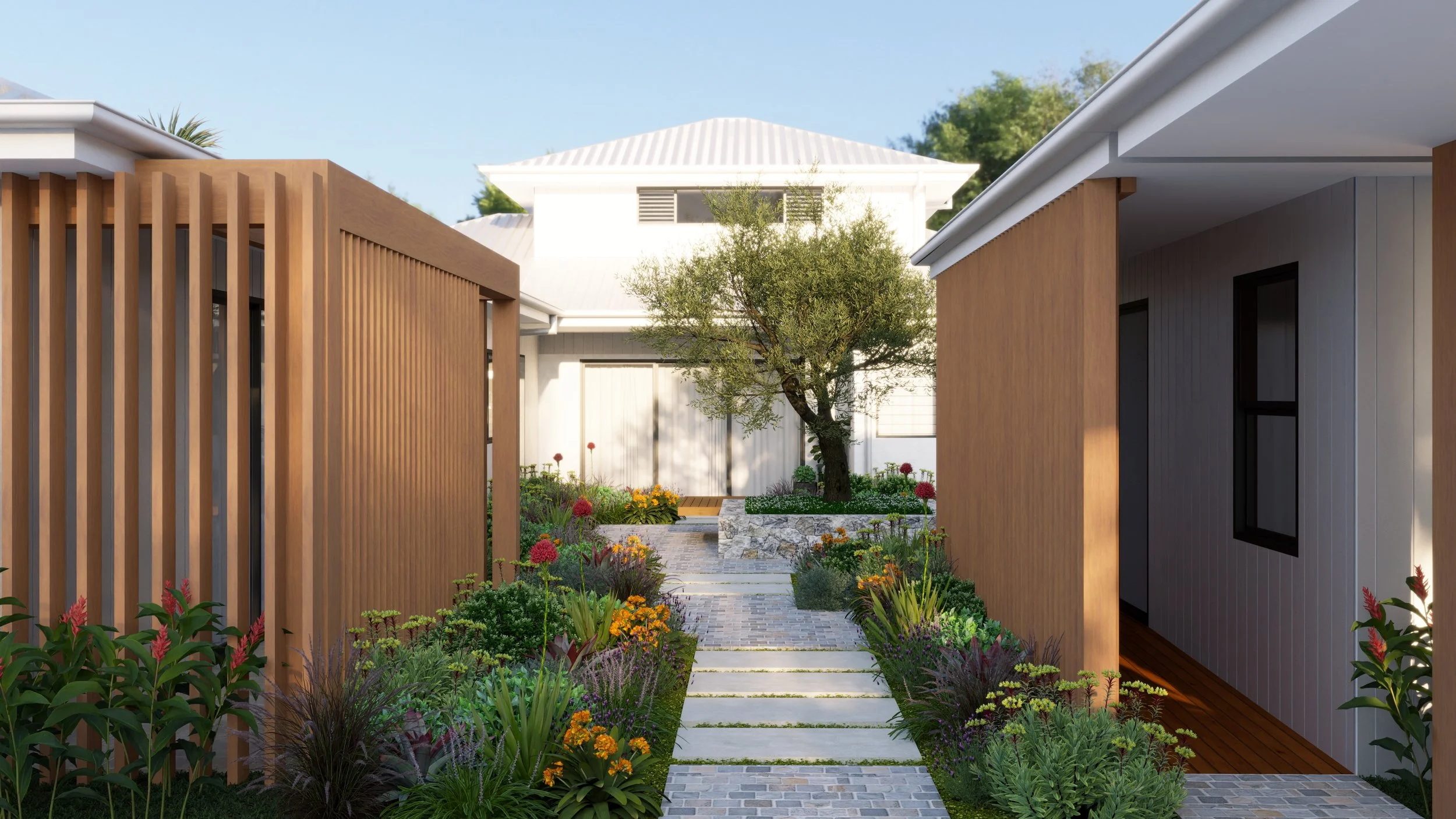 Modern house with wooden exterior, outdoor deck, and minimalist landscaping under a clear blue sky.
