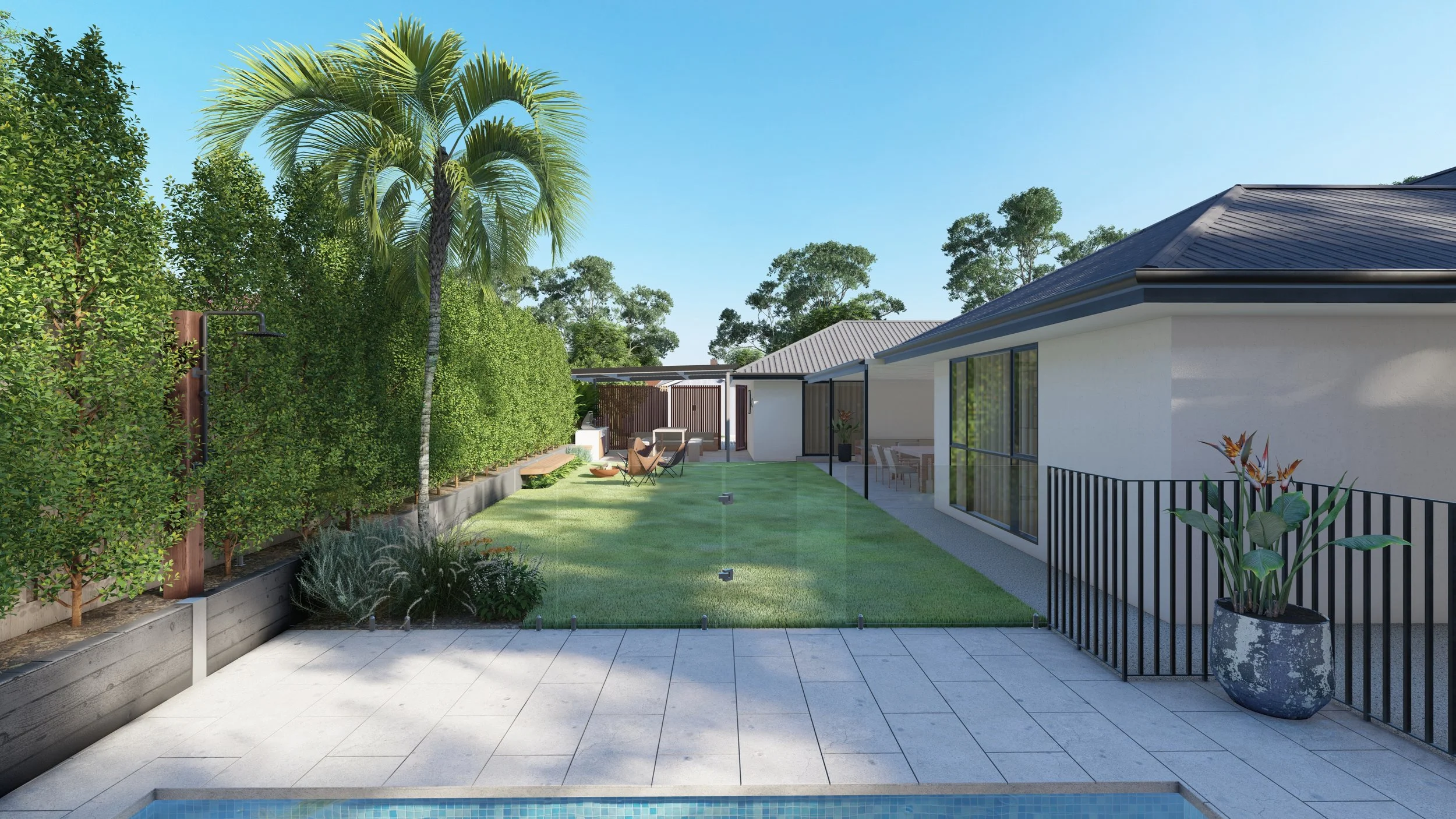 Modern backyard with swimming pool, green lawn, patio area, outdoor furniture, potted plants, tall palm tree, and neighboring houses with trees in the background.