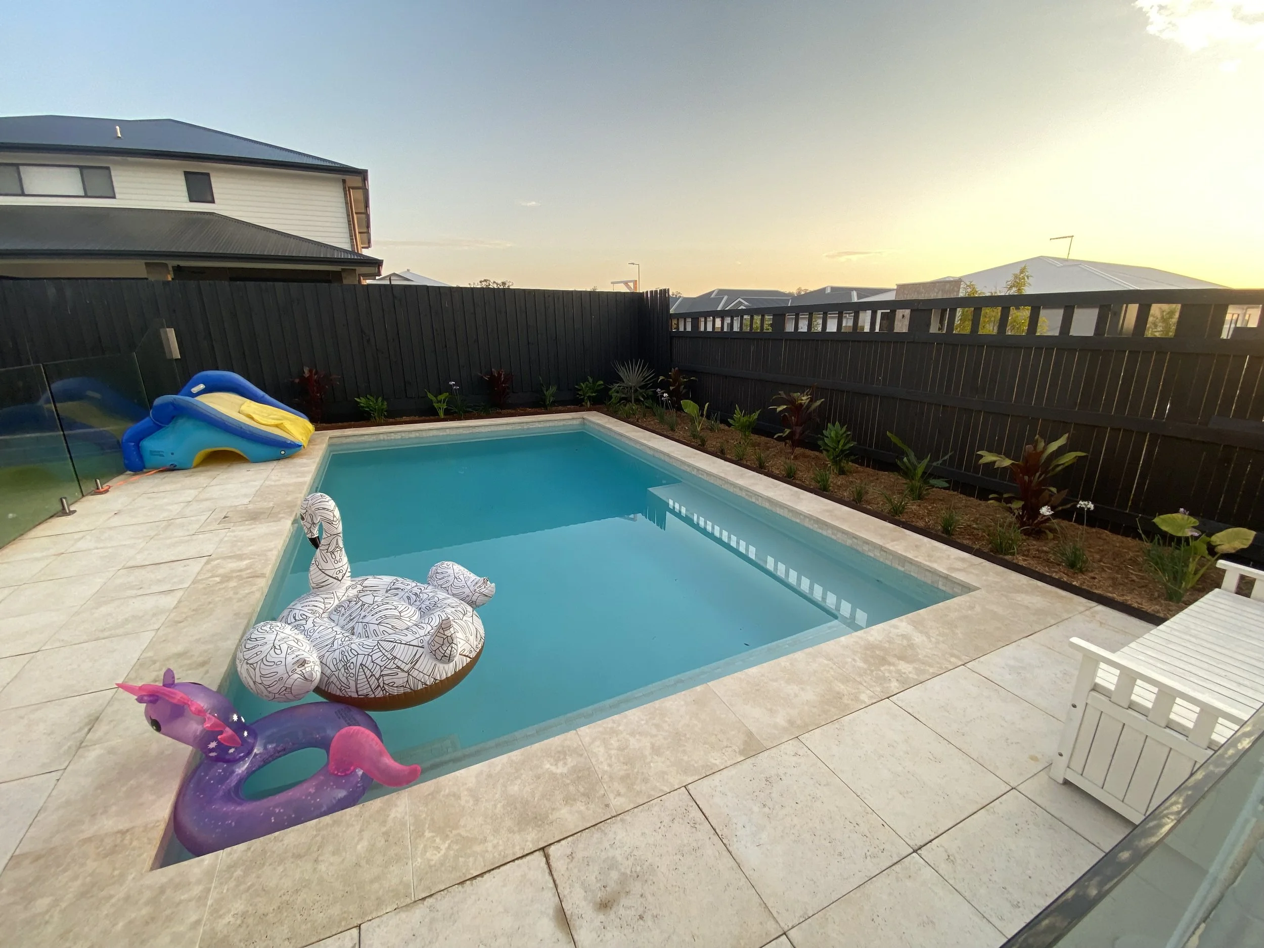 Custom-built elevated swimming pool with poolside pavilion - Brisbane landscaping project