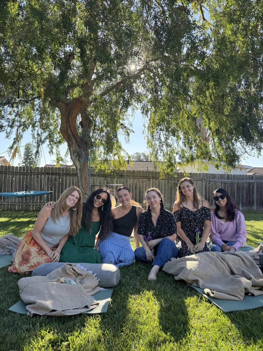Women gathered outdoors for a private ceremony