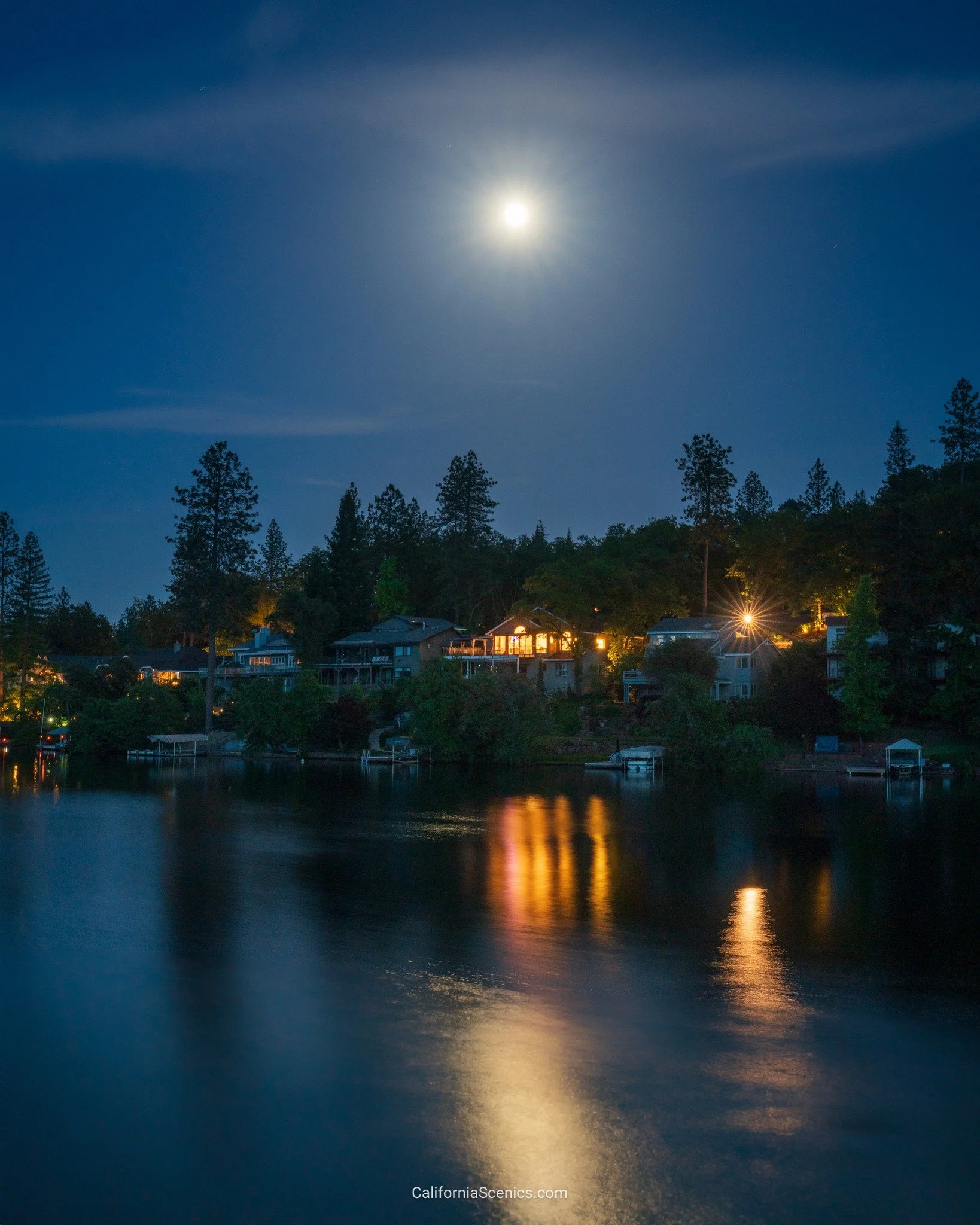 A beautiful moon rising up over a lake in Northern California.
