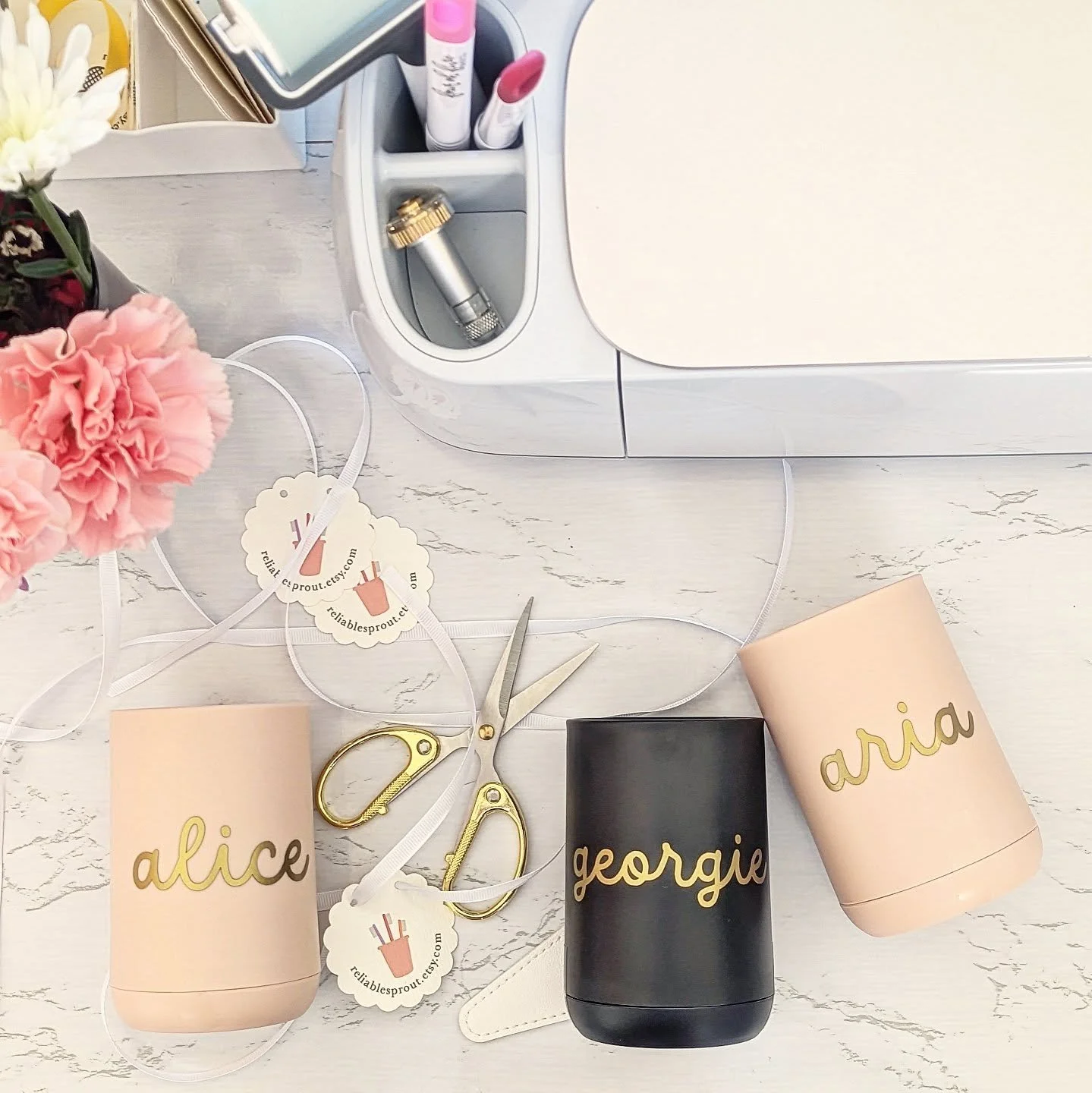 Custom toddler toothbrush cups ready to ship from our Sandia Heights studio! They're 25% off right now, come in classic colors with shiny gold personalization, and are super easy to clean. Love how they help little ones feel independent, confident, a