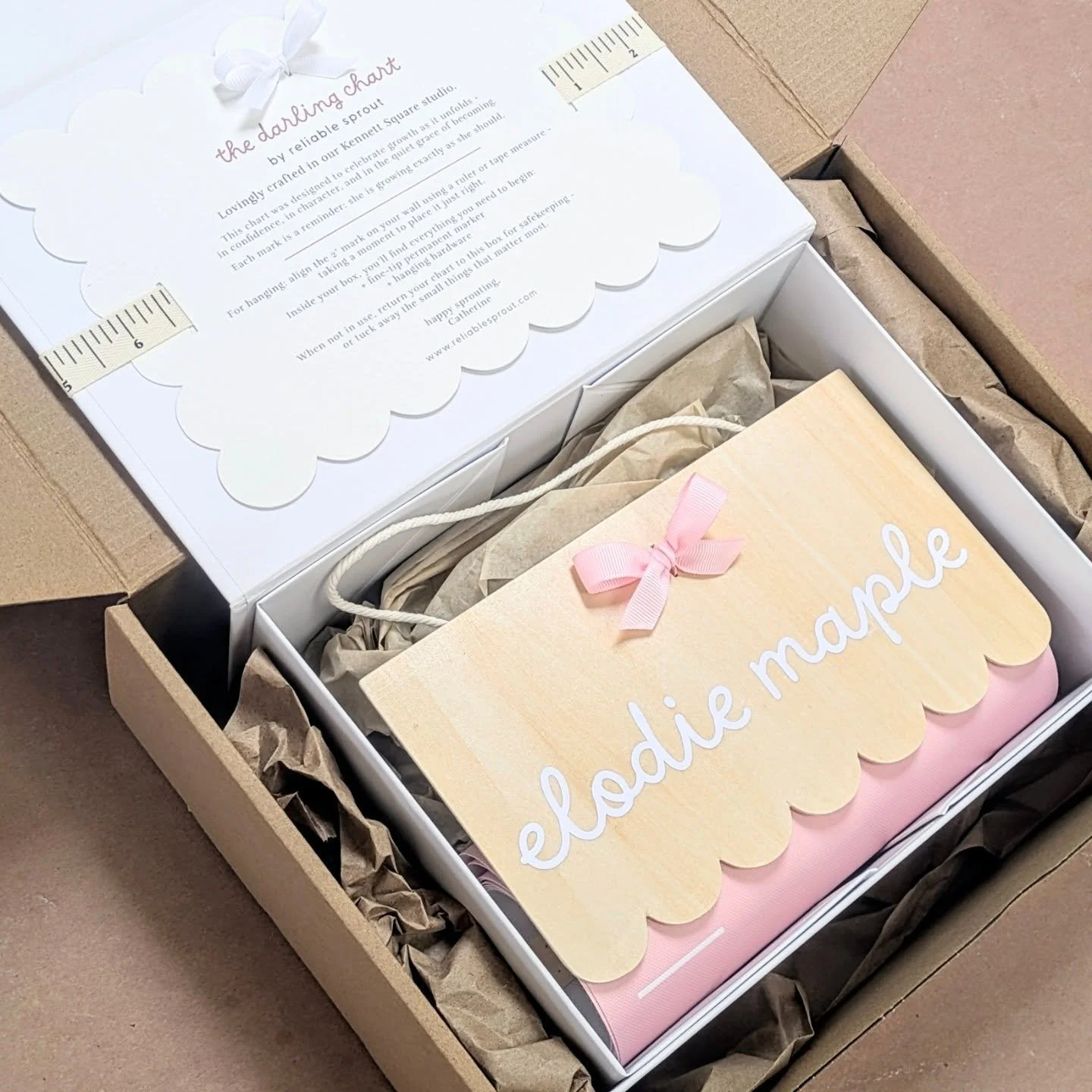 There are pieces you buy for now, and pieces you choose for a lifetime.

Our custom growth charts are designed to mark the quiet, meaningful rhythm of childhood&mdash;every inch, every season, every small becoming. Finished in soft pink with a wooden