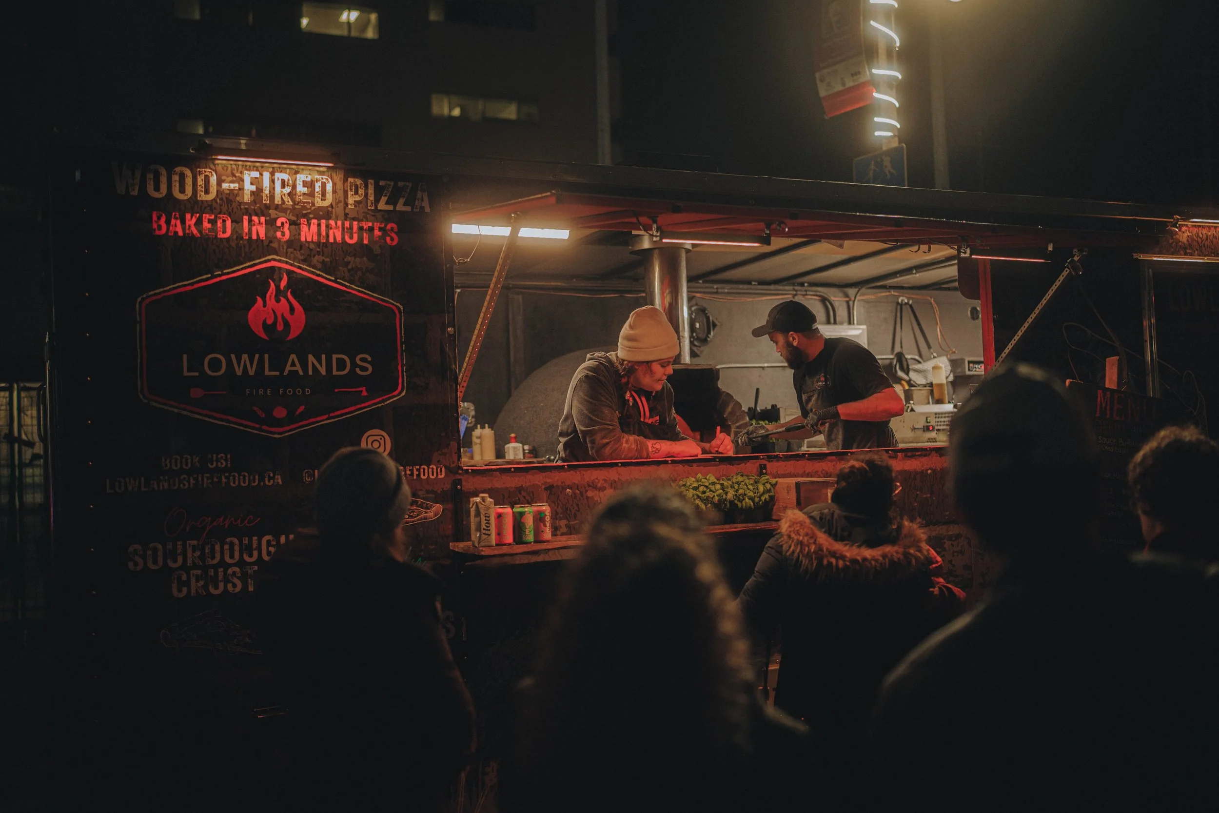 Lowlands Fire Food wood fired pizza food truck catering at an event
