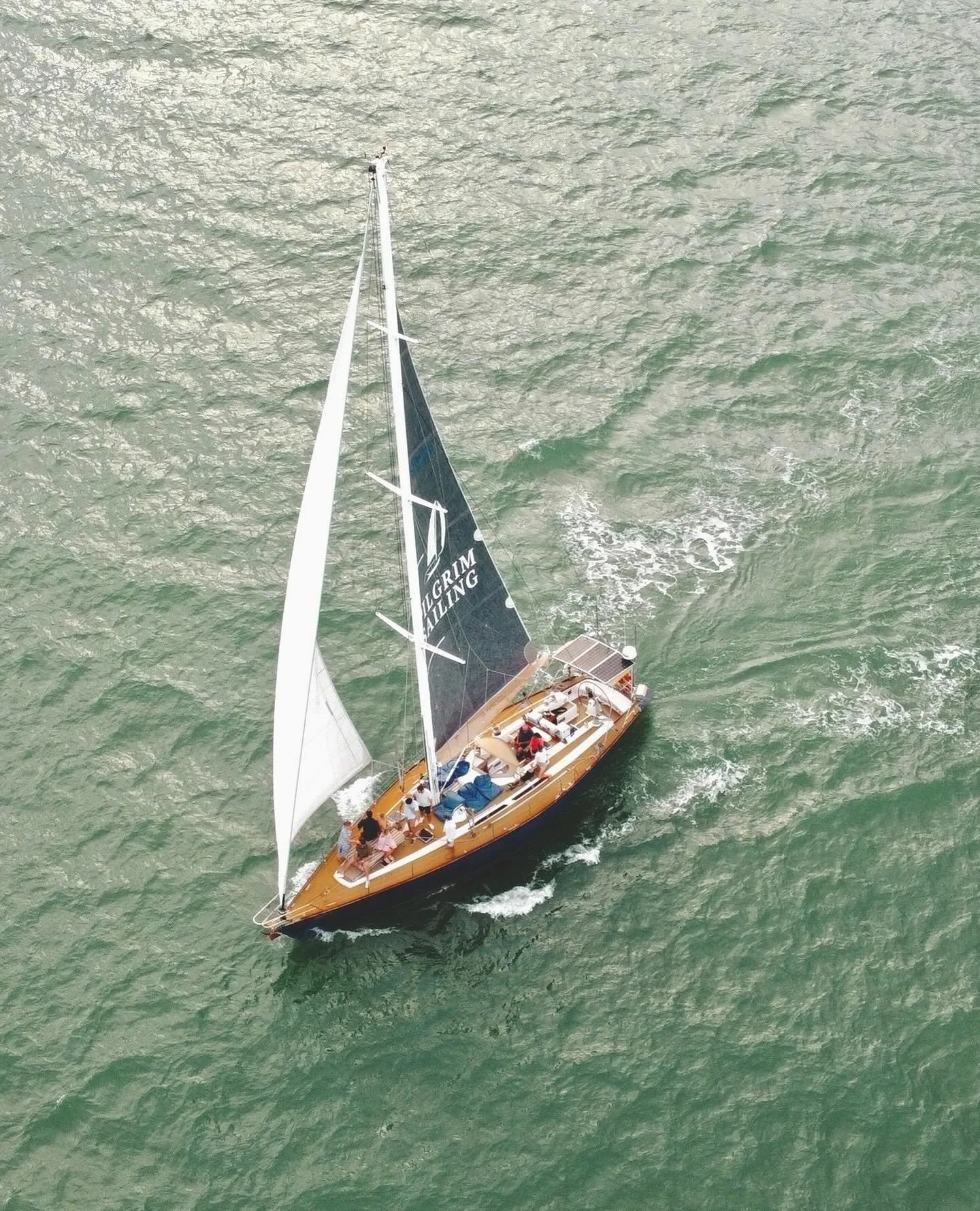 Magic at sea — that’s what we’re all about.
From golden hour glows to the hush of sails, there’s something special about sailing with Pilgrim. She’s not just any boat — she carries stories and soul on every sail