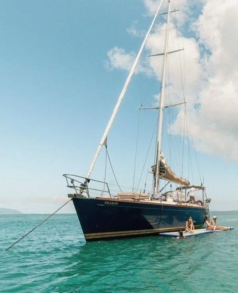 This is our kind of lunchtime. Anchor down, feet in the water, lunch in the fresh air!⁠
⁠
#pilgrimmagneticisland #pilgrimsailing #thisismagneticisland ⁠
#magneticisland #upforunexpected #slowtravel