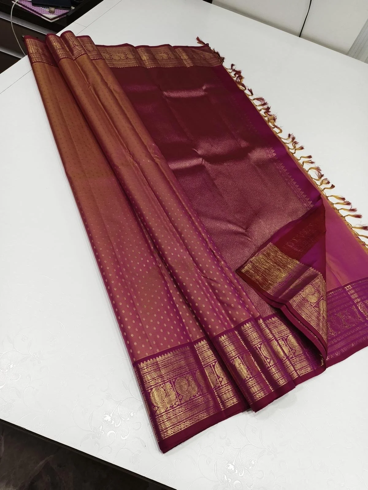 Pure Kanchipuram silk saree( pink, magenta and gold with running blouse. grand pallu and, thick border. dual tone colour)