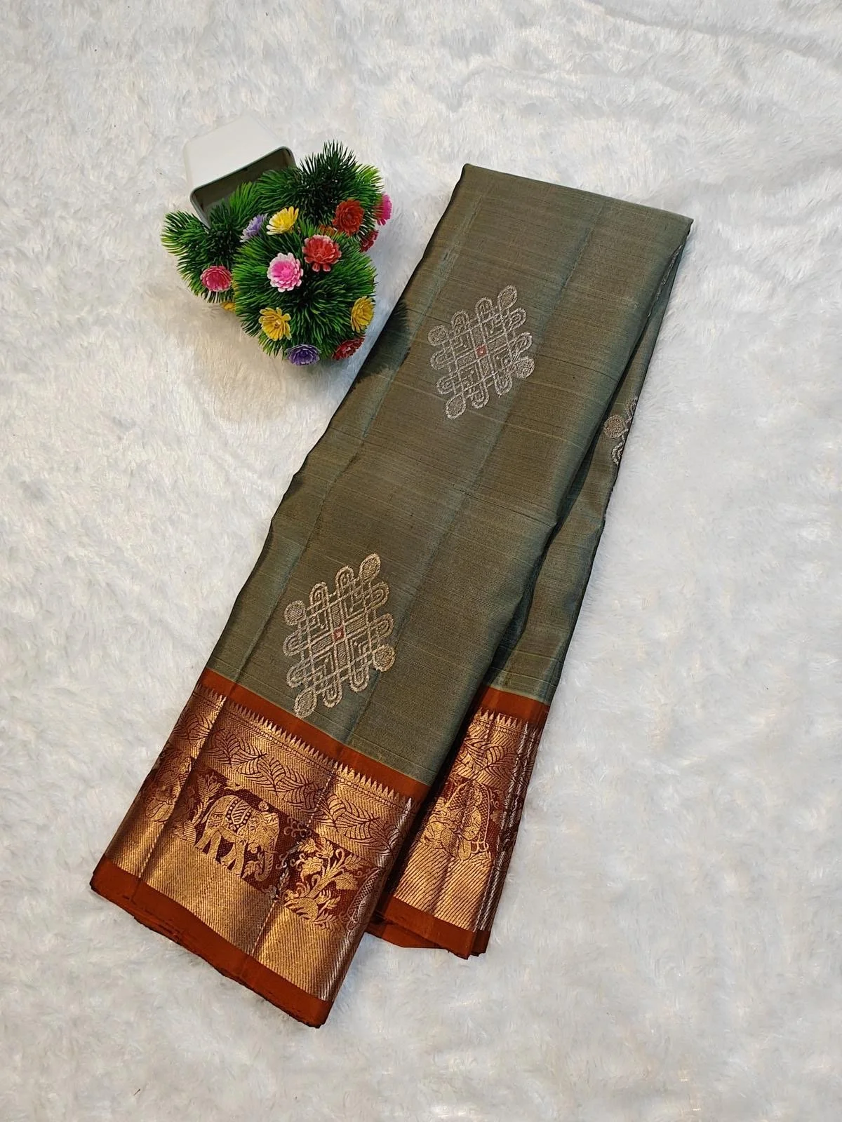 Kanchipuram silk saree (elachi/cardamom green, 0range and gold . grand pallu and, thick border. )