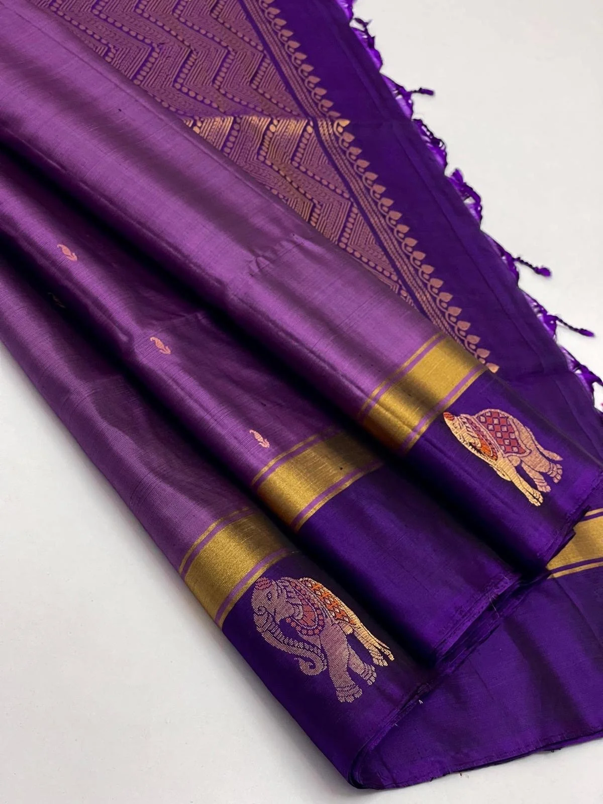 Pure Kanchipuram silk saree (purple, dark purple with gold zari. elephant zari motives on allover the border)) (Copy)
