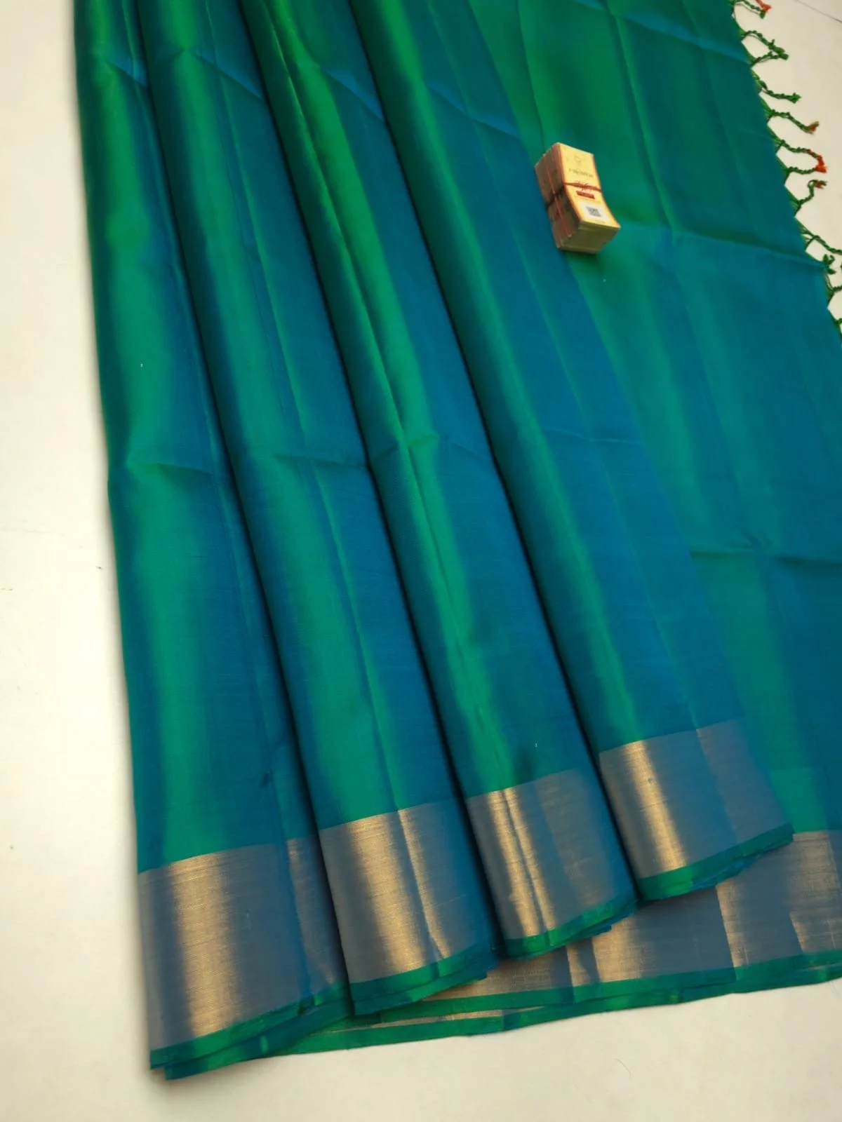 Pure Kanchipuram soft silk saree(peacock blue/green with gold border)