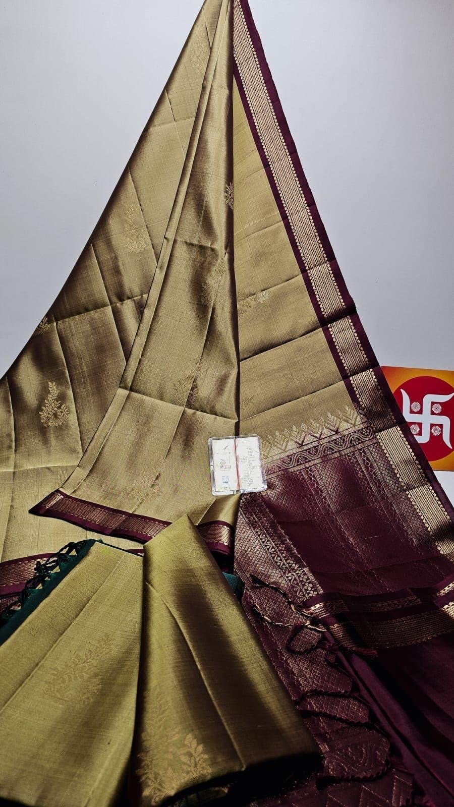 Pure Kanchipuram silk saree (olive green and maroon with contrasting blouse. small,thick border.)