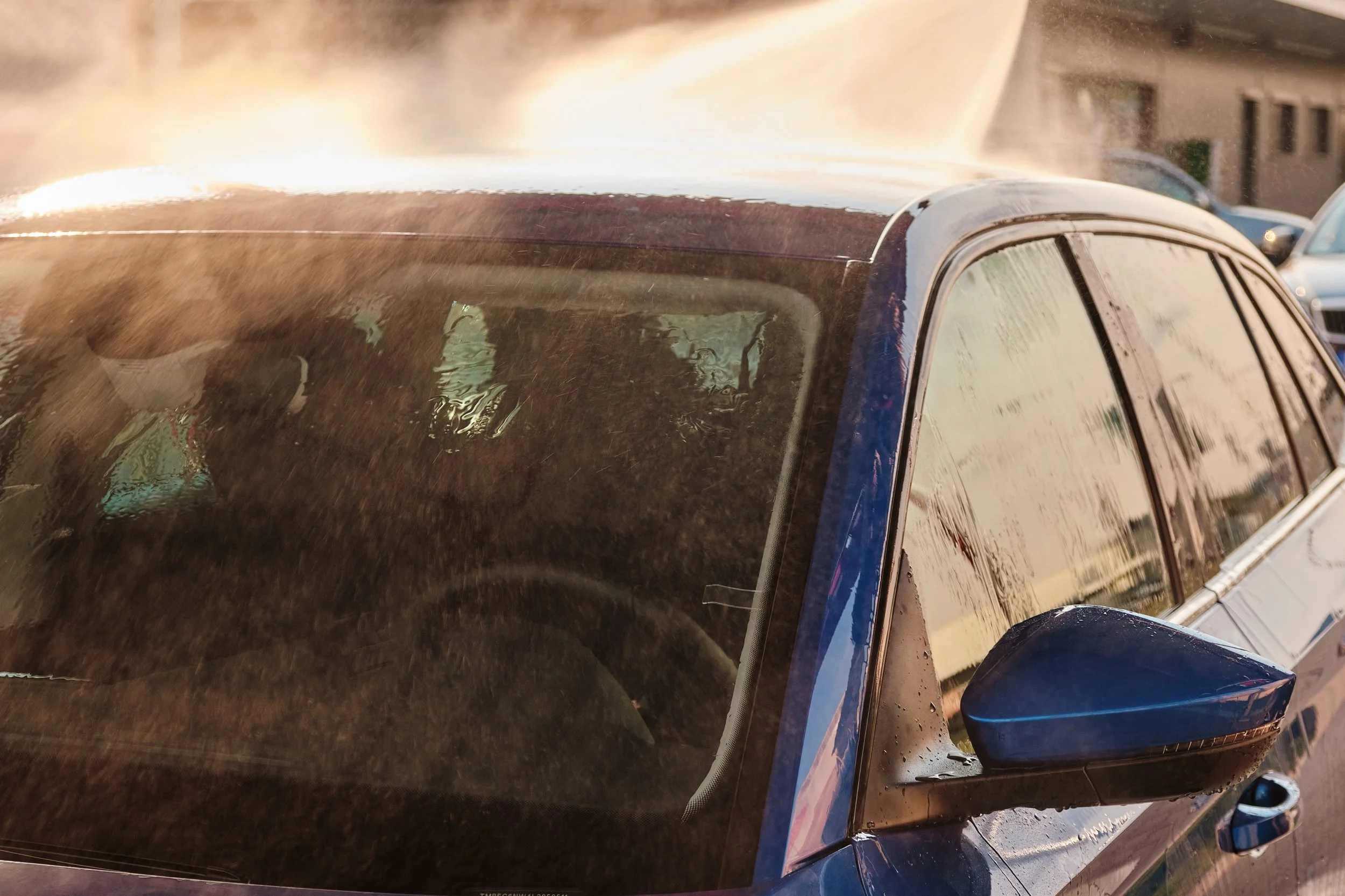 manual-car-washing-using-a-high-pressure-water-si-2025-03-09-19-12-16-utc.jpg