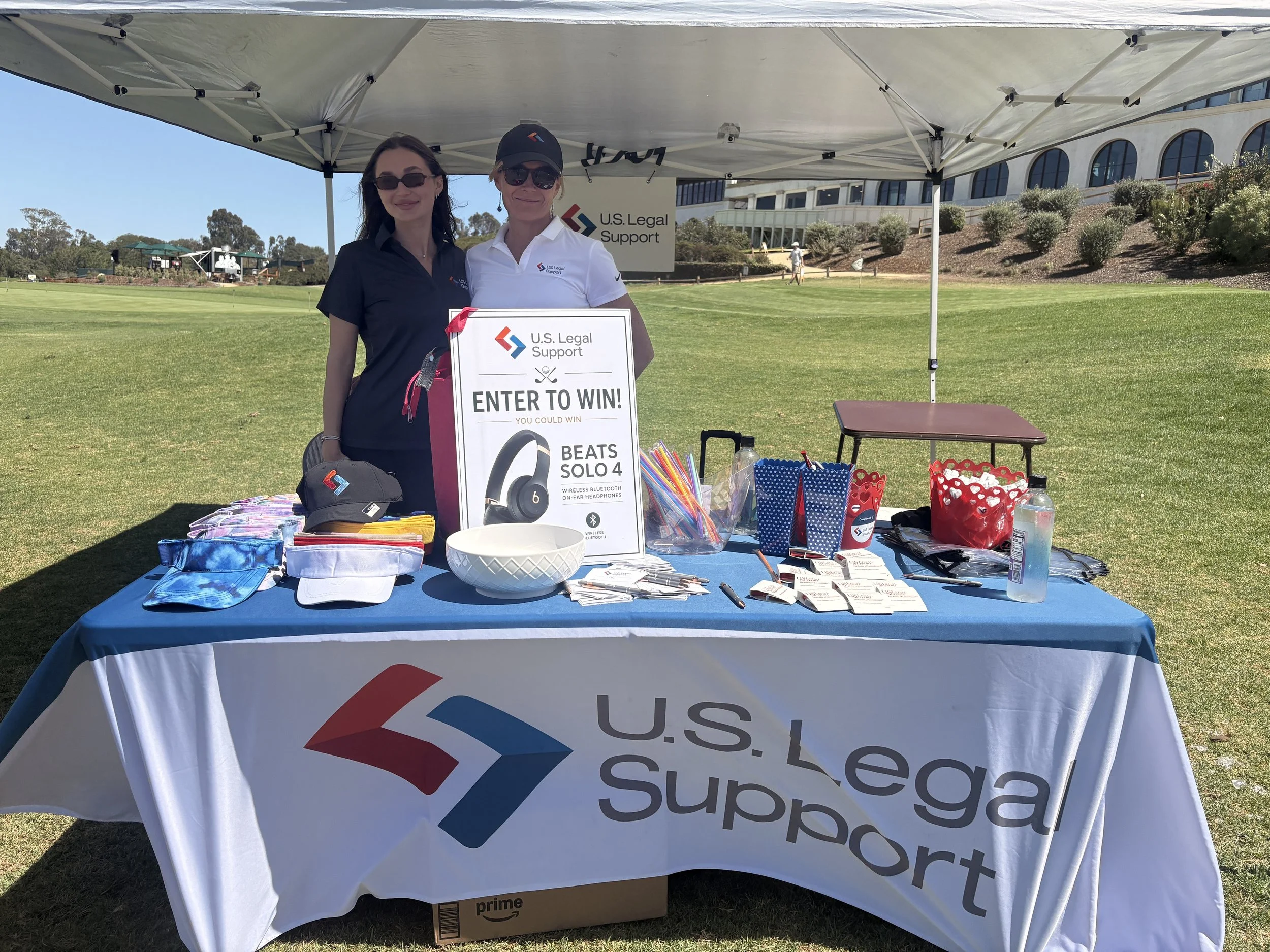 Golf for Justice supporters gathered at the event