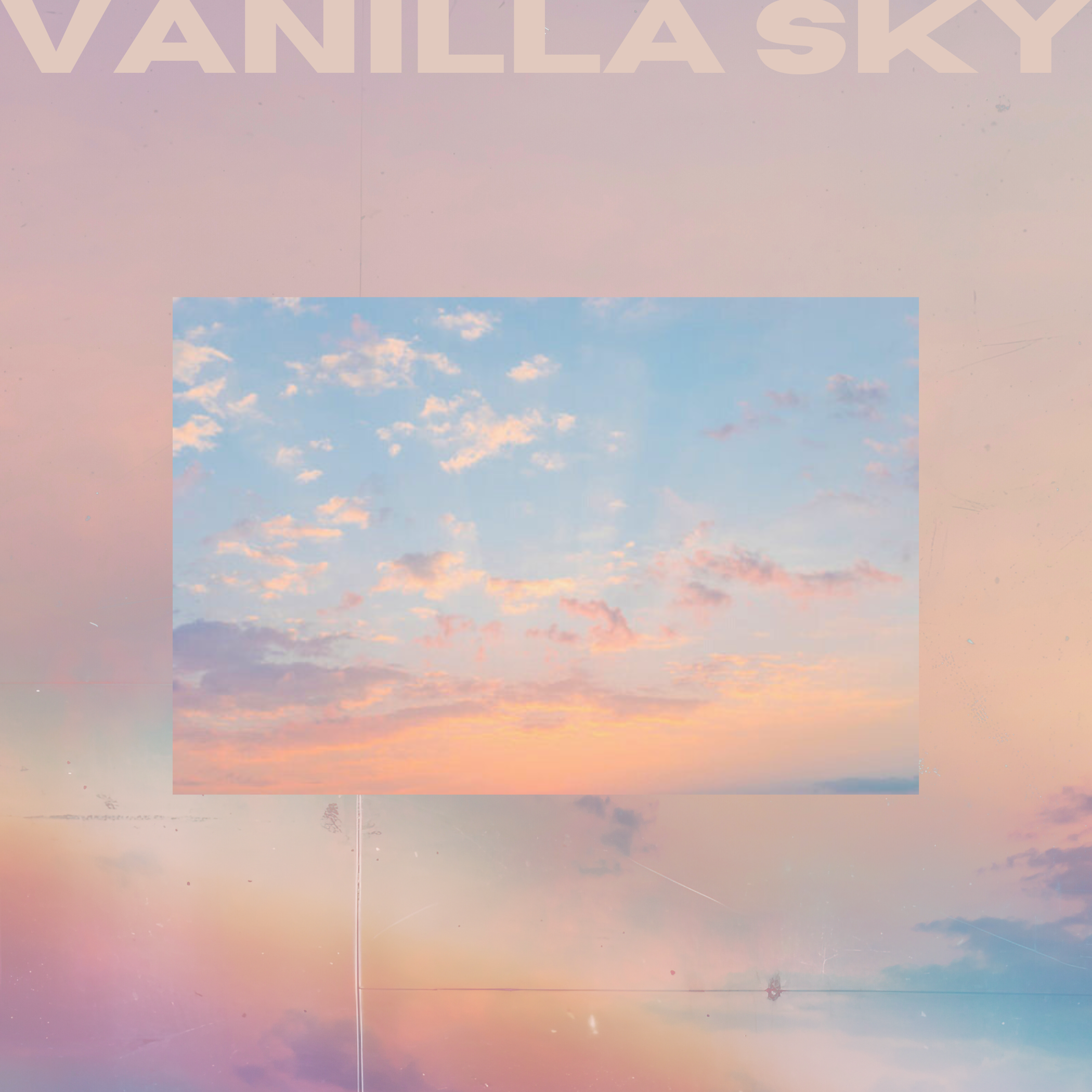 A scenic sky with pastel-colored clouds at sunset, featuring pink, orange, and blue hues.