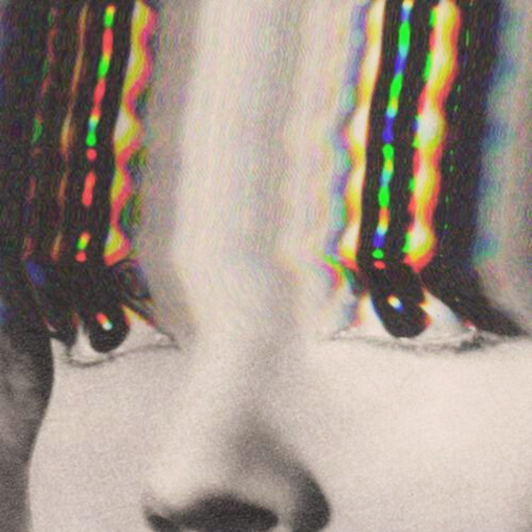 Close-up of a woman's face with distorted, glitch-like colorful lines over the eyes.