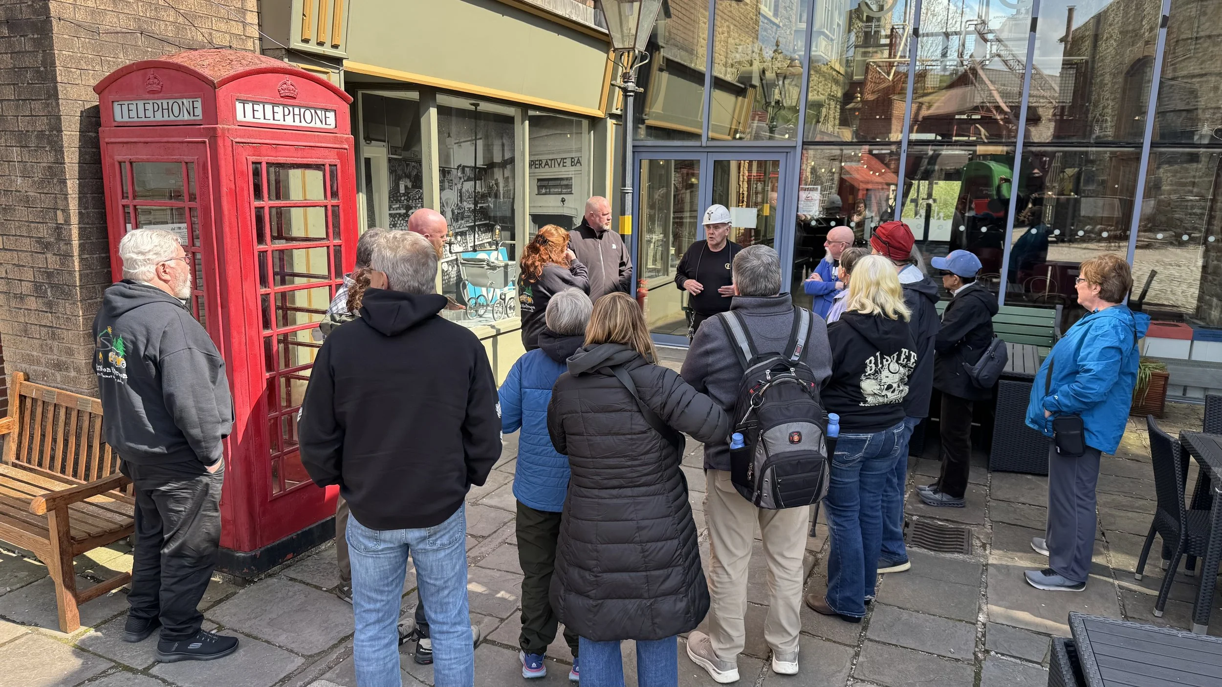  a group of holiday makers having a tour of a coal mine 