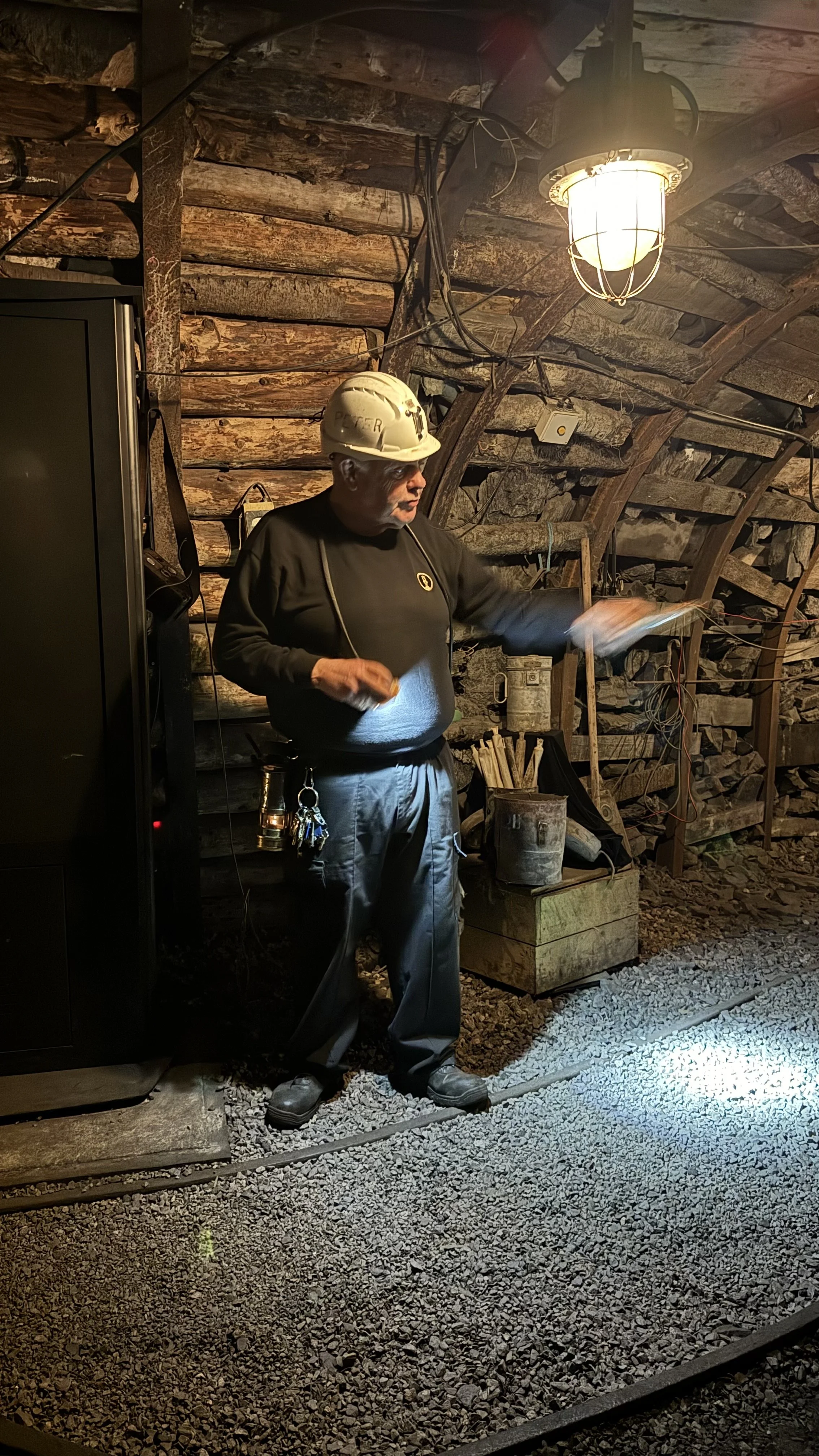  a tour guide in the mines at the Rhonda Heritage Museum 