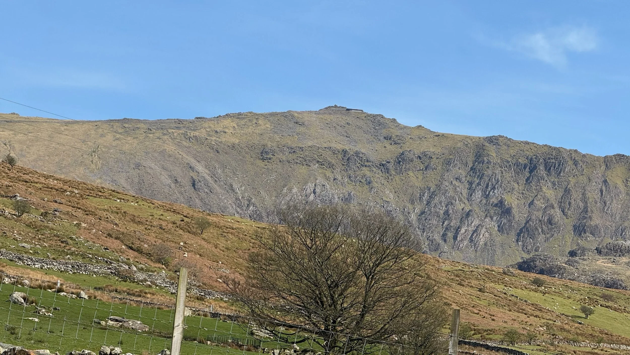 Steam train travelling through Snowdonia in North Wales