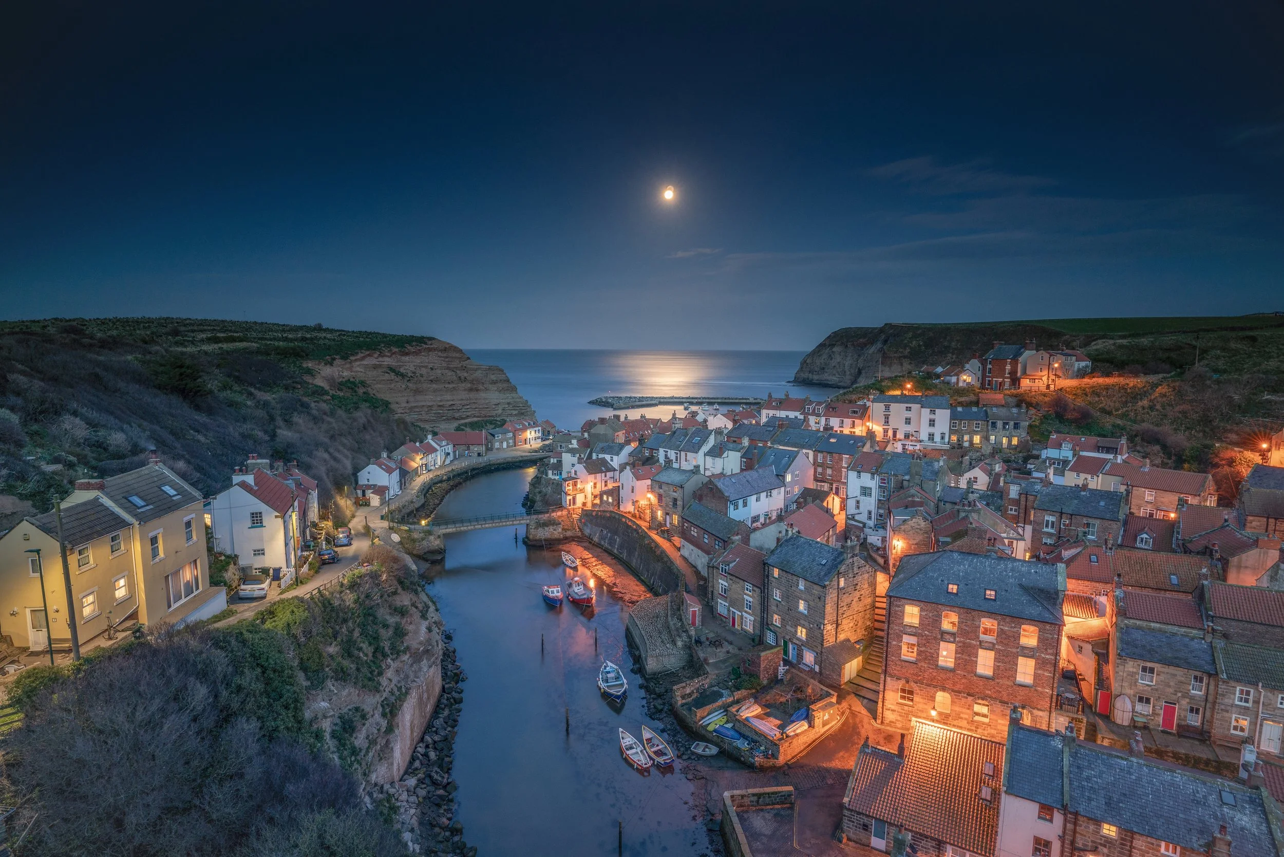 Moonrise over the North Yorkshire fishing village of Staithes.