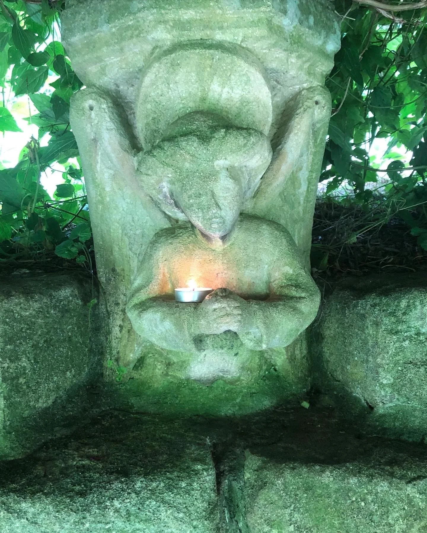 statue with candle .jpg