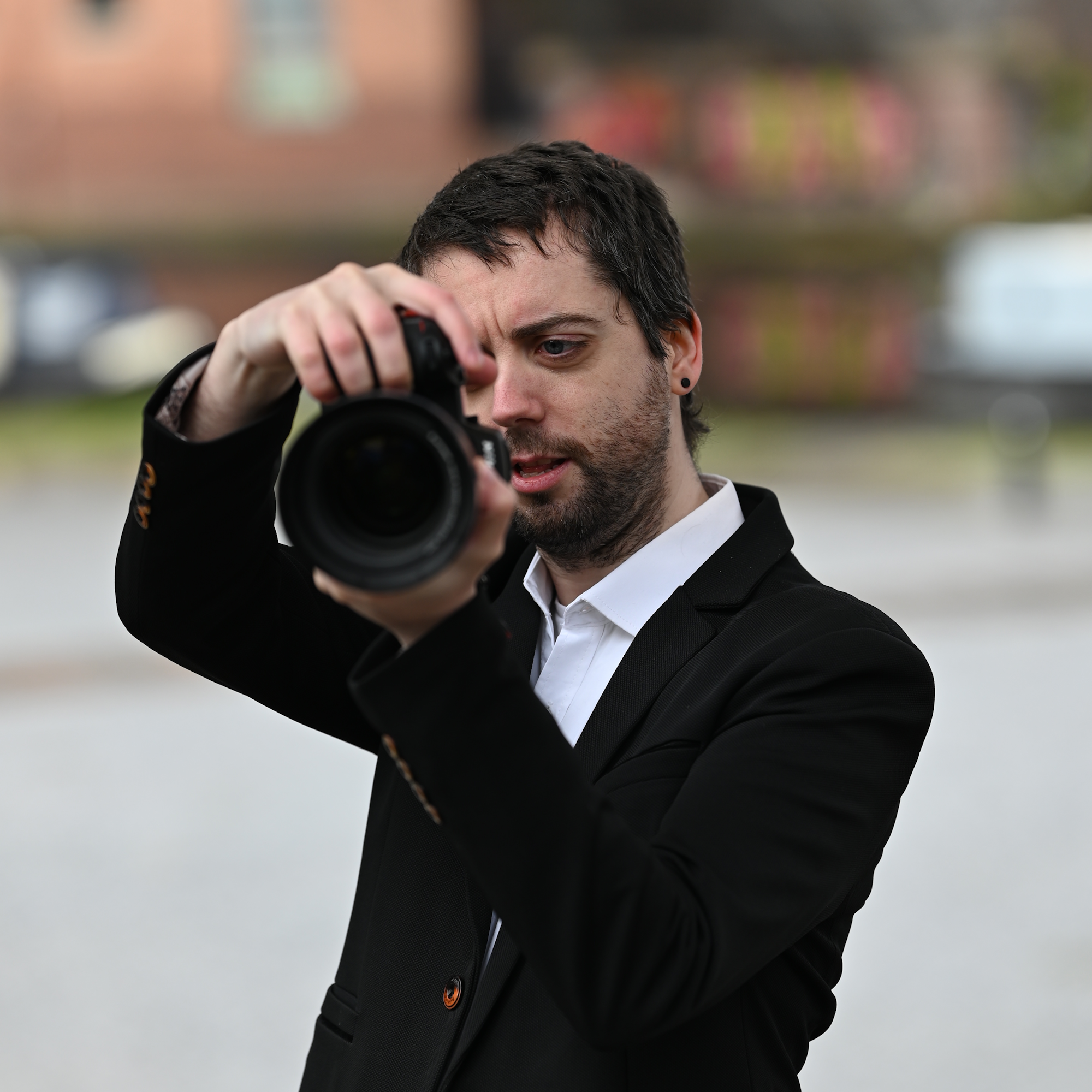 Me, pointing a camera at you