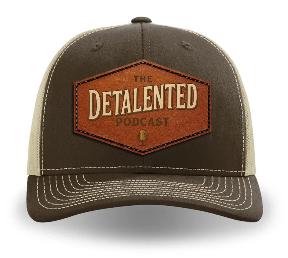 DeTalented Podcast Leather Patch Trucker Hat