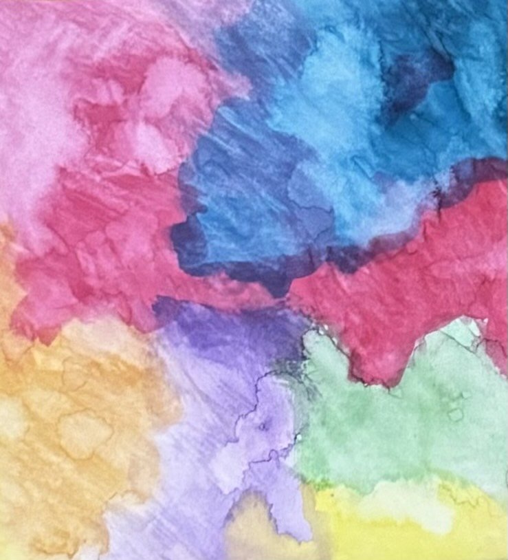 Abstract watercolor painting with vibrant colors, including blue, pink, yellow, and purple, blending together.