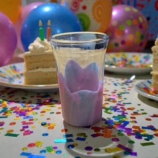 Birthday Party Shot Glass on a Table.jpeg