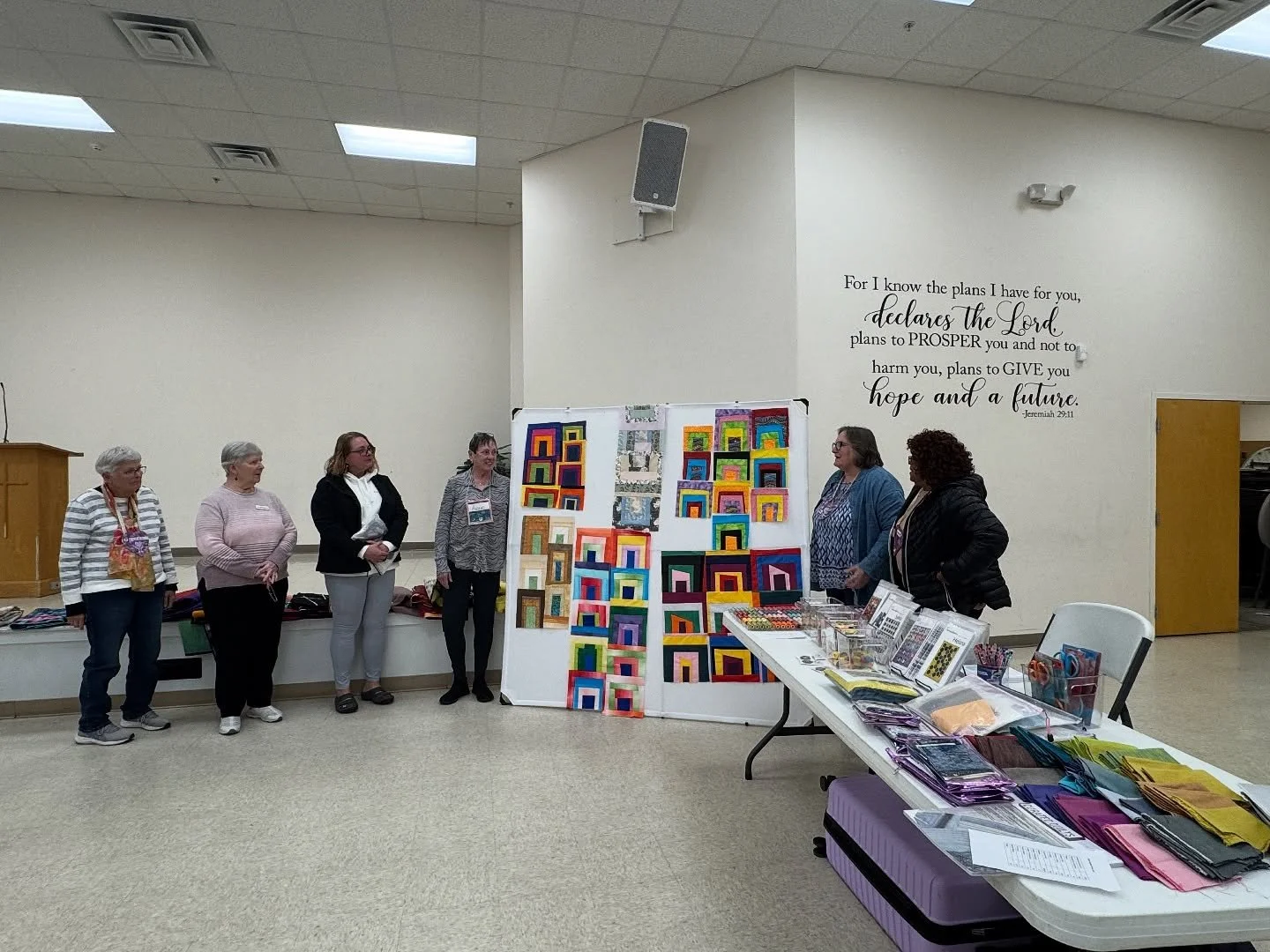 Some snapshots from a truly excellent day at Helping Hands Quilt Guild. 

Students and their projects. 
We break out all the tricks to solve problems. Partial seams wasn&rsquo;t on the agenda, but we do what we must. 
Portable design wall is absolute