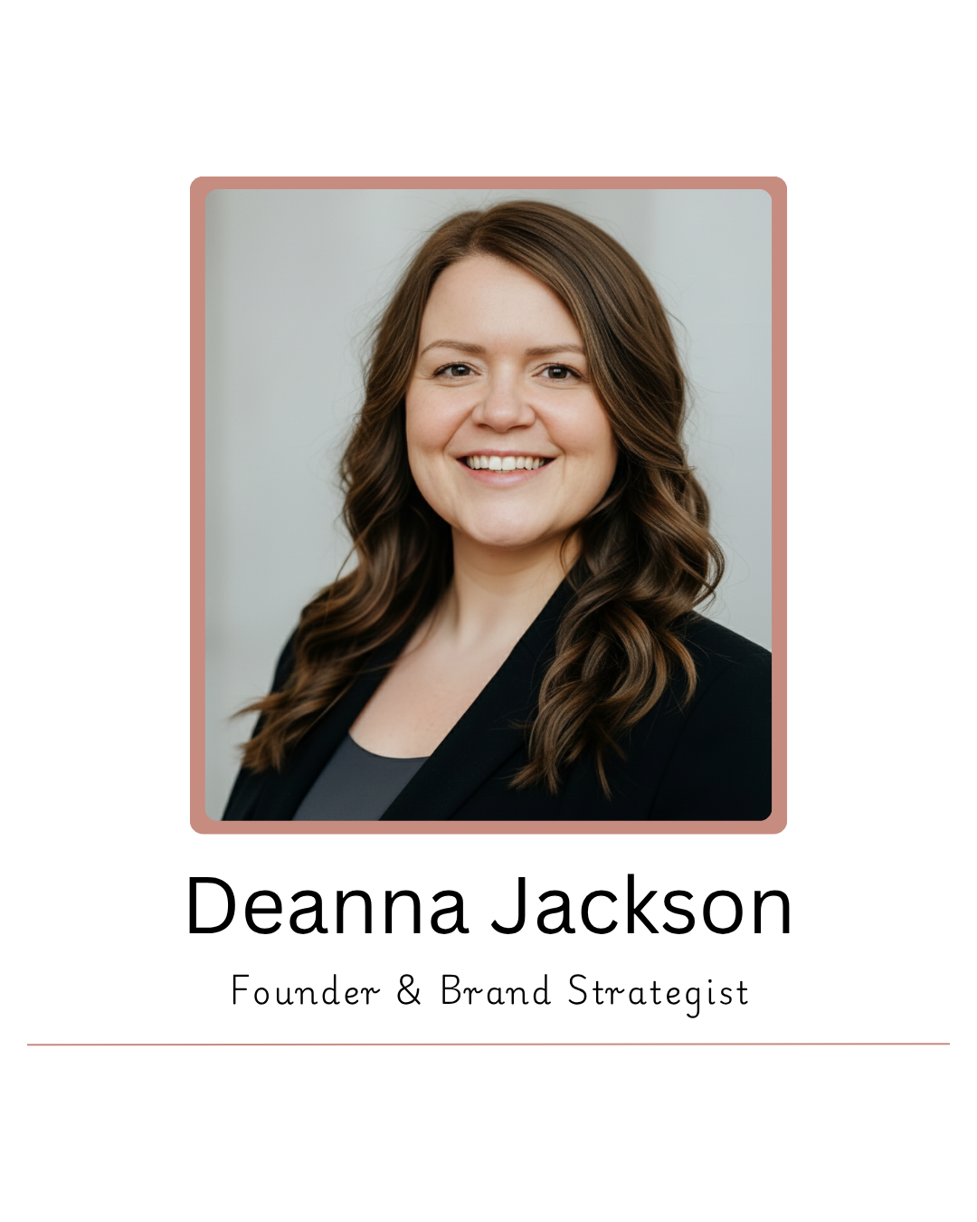 Professional headshot of a woman with shoulder-length wavy brown hair, smiling, wearing a black blazer over a gray top, against a neutral background.