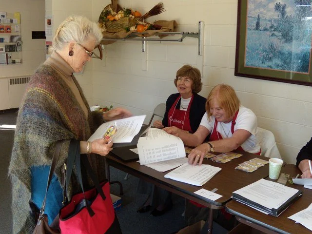 ecw-registration-table-volunteers.jpg
