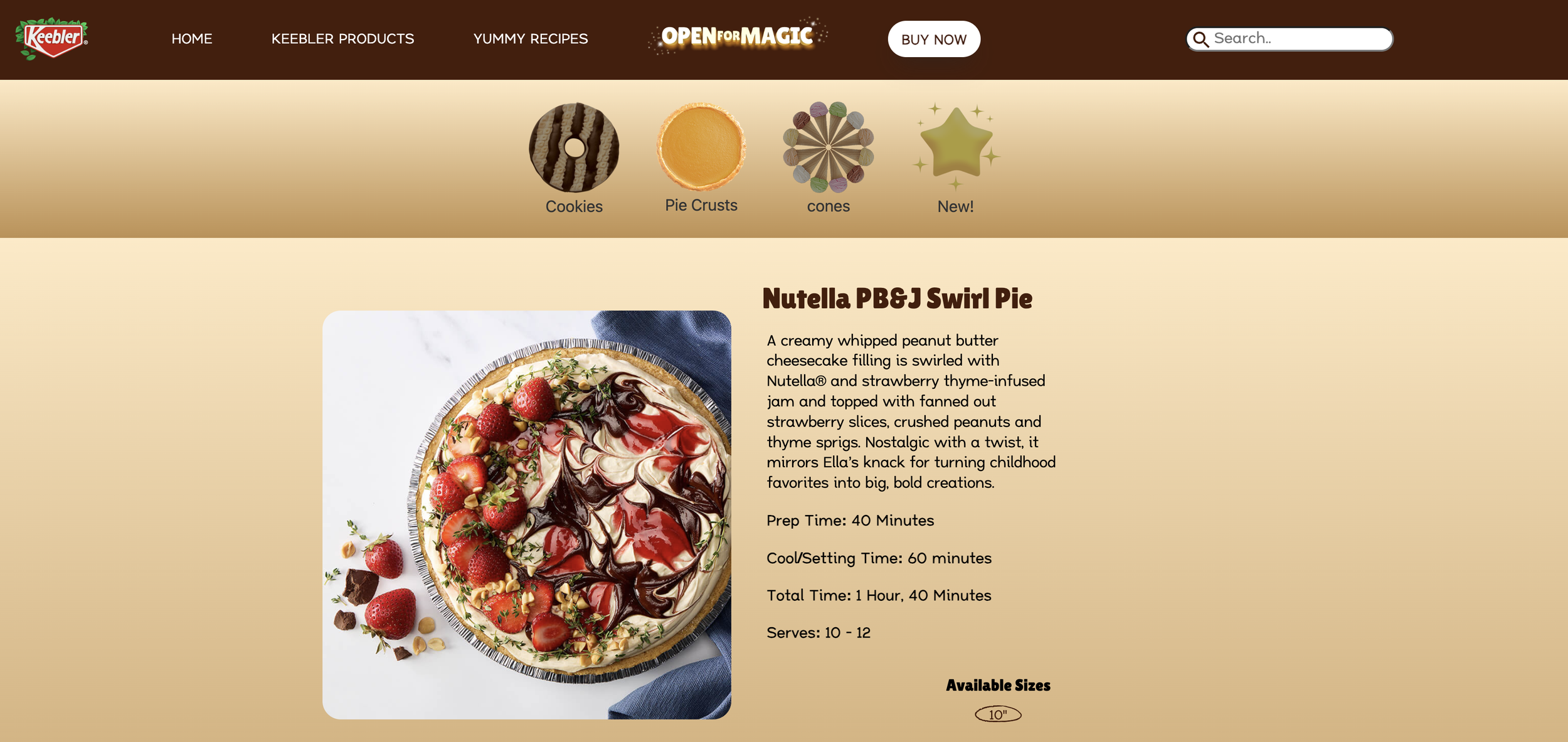 A cheesecake topped with strawberries, chocolate, and various toppings on a round tray, with some scattered around.