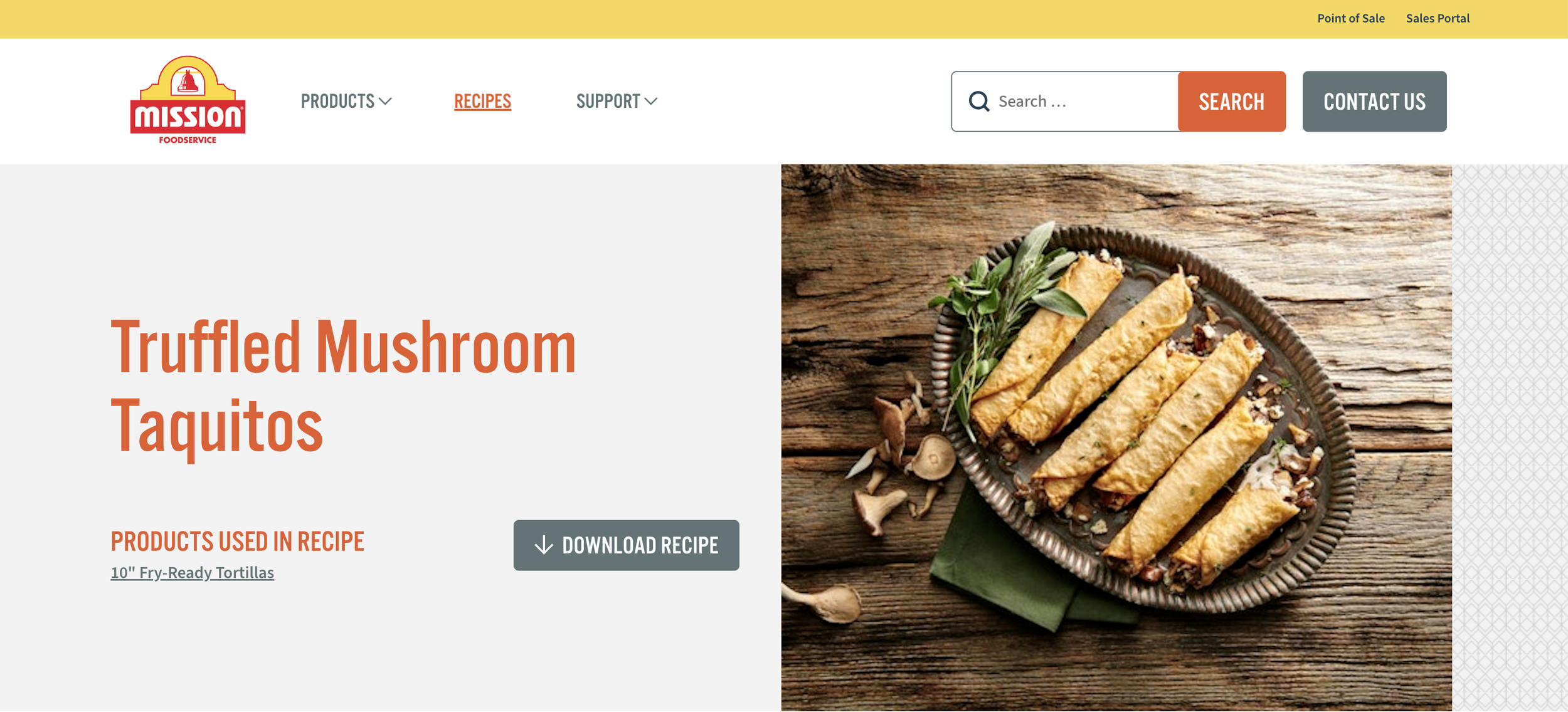 Plate of five mushroom-filled taquitos garnished with green herbs on a wooden table.