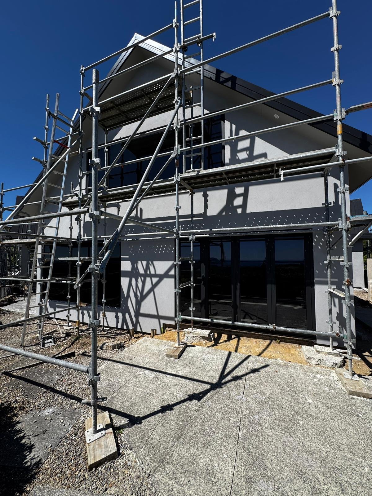 Completed cladding installation with full plastering and Stolit Milano finish in Te Puna, Tauranga, offering superior durability, modern look, and long-lasting weather protection for exterior surfaces.