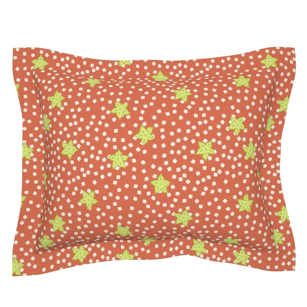 A juicy scatter of starfruit with swirling white confetti on a coral background. A fun, fruity blender print perfect for quilting, swimwear, or bright tropical apparel.