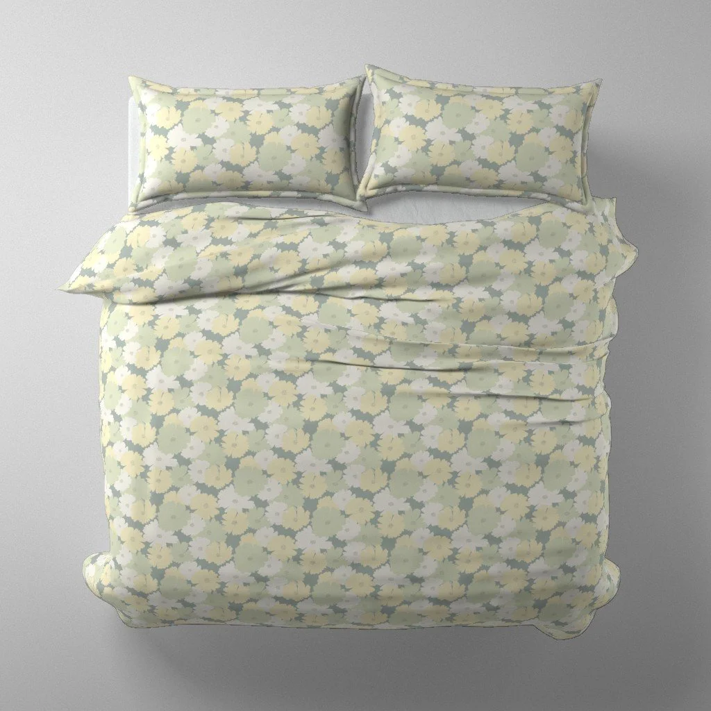 Stylized desert cosmos floral blossoms in a half-drop pattern with soft yellow, light green and sage