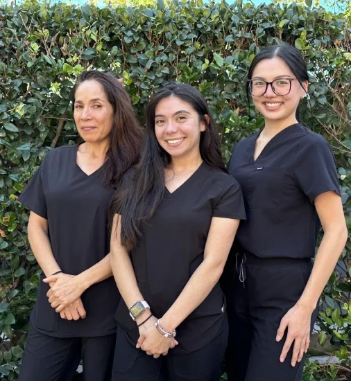 Dentist consulting with a patient in Irvine