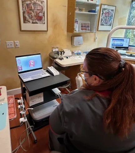 Dentist consulting with a patient in Irvine
