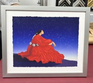 Woman in red dress against night sky.jpg