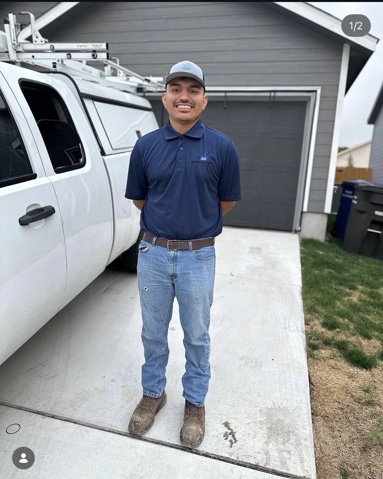 George Weizmann, owner of Weizmann Plumbing LLC, standing by the work truck