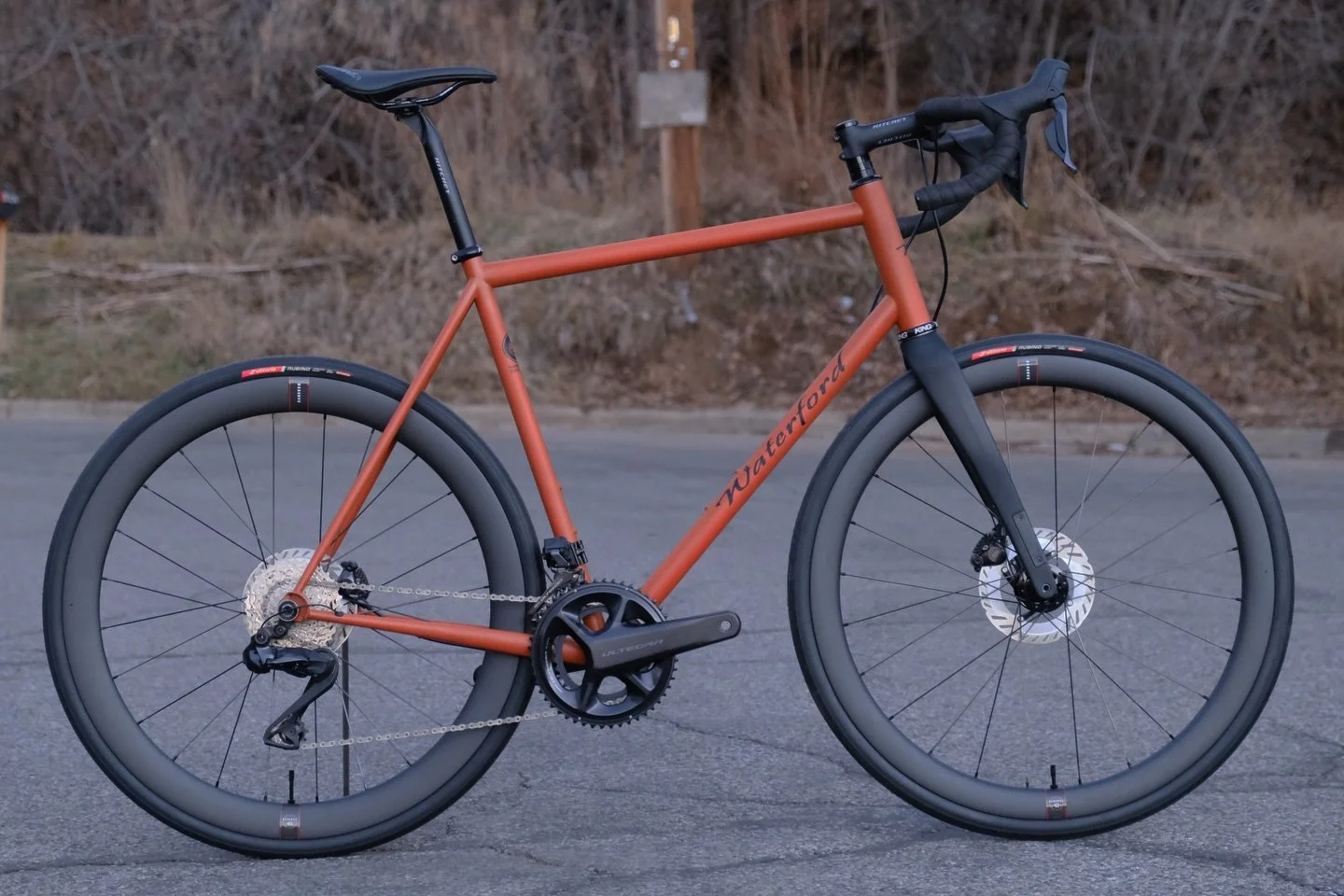 Classic &amp; sleek lines, with all the modern amenities!

This 33-Series All-Road is absolutely beautiful with its burnt orange base, black logos &amp; matte clear finish! Accented perfectly with matching @chriskingbuzz components and rolling even f